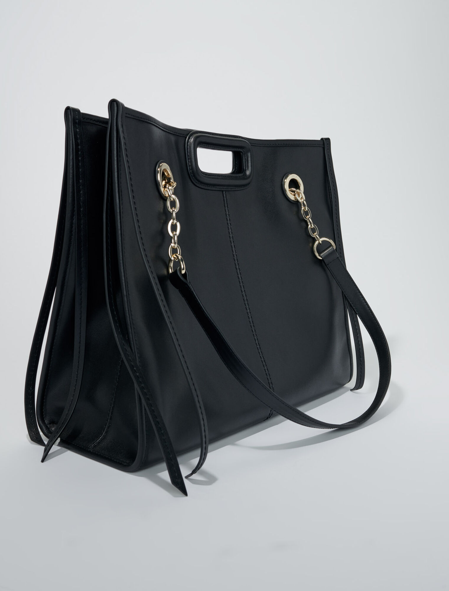 Bolso cabás de cuero con flecos