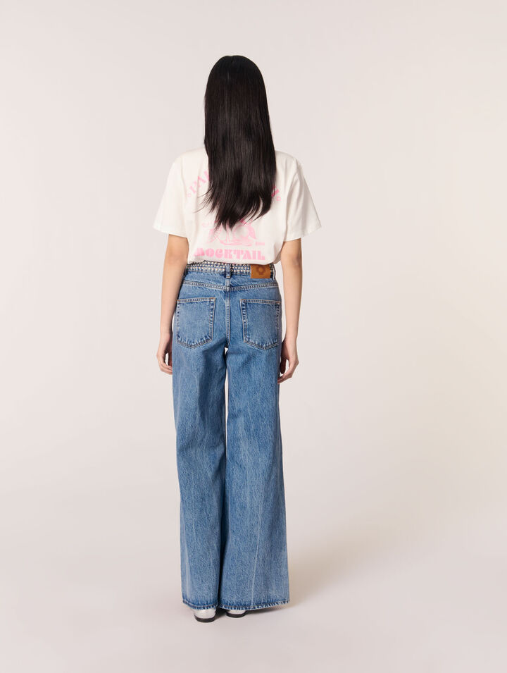 Jeans flare con cintura de clavos