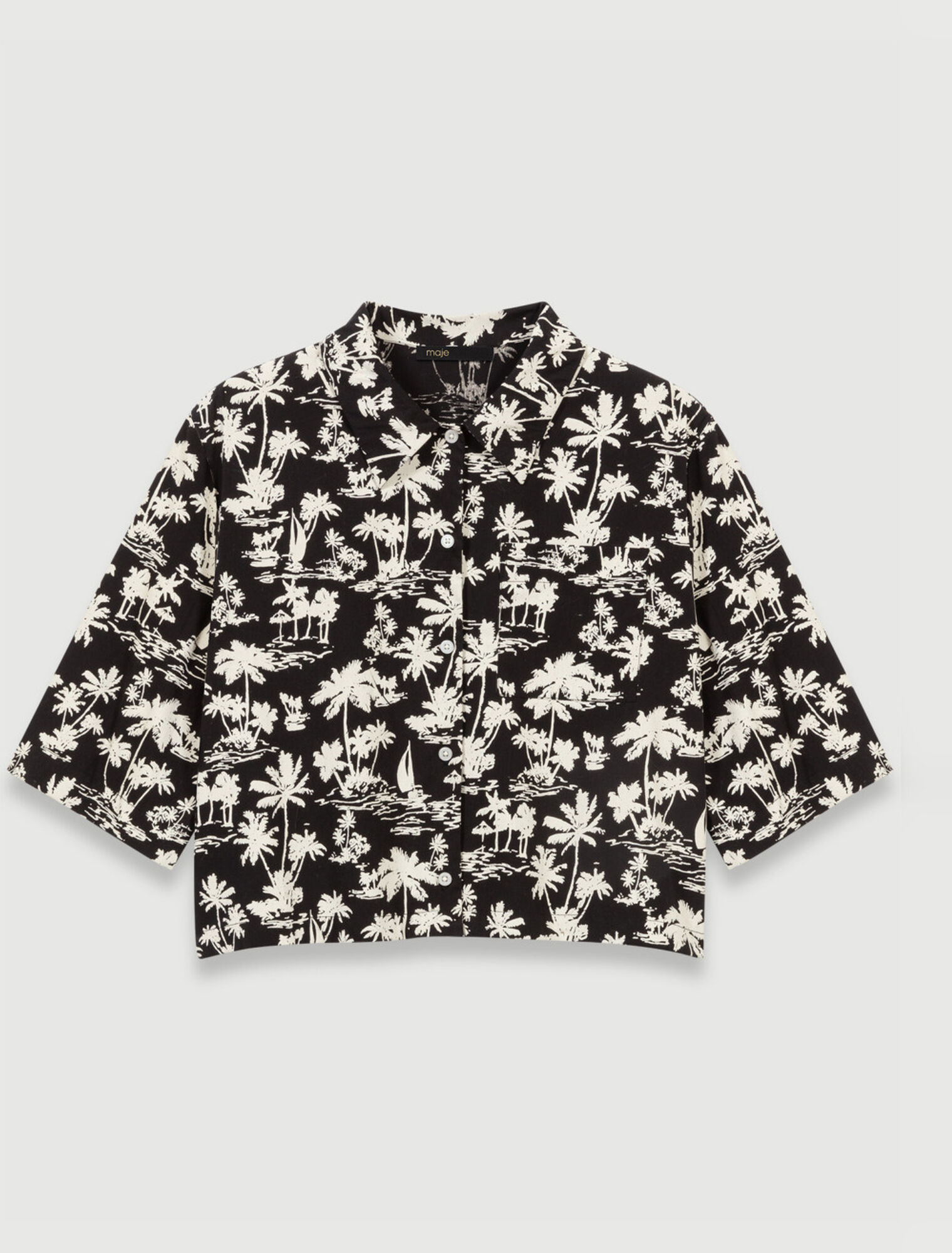 Camisa corta estampado palmeras
