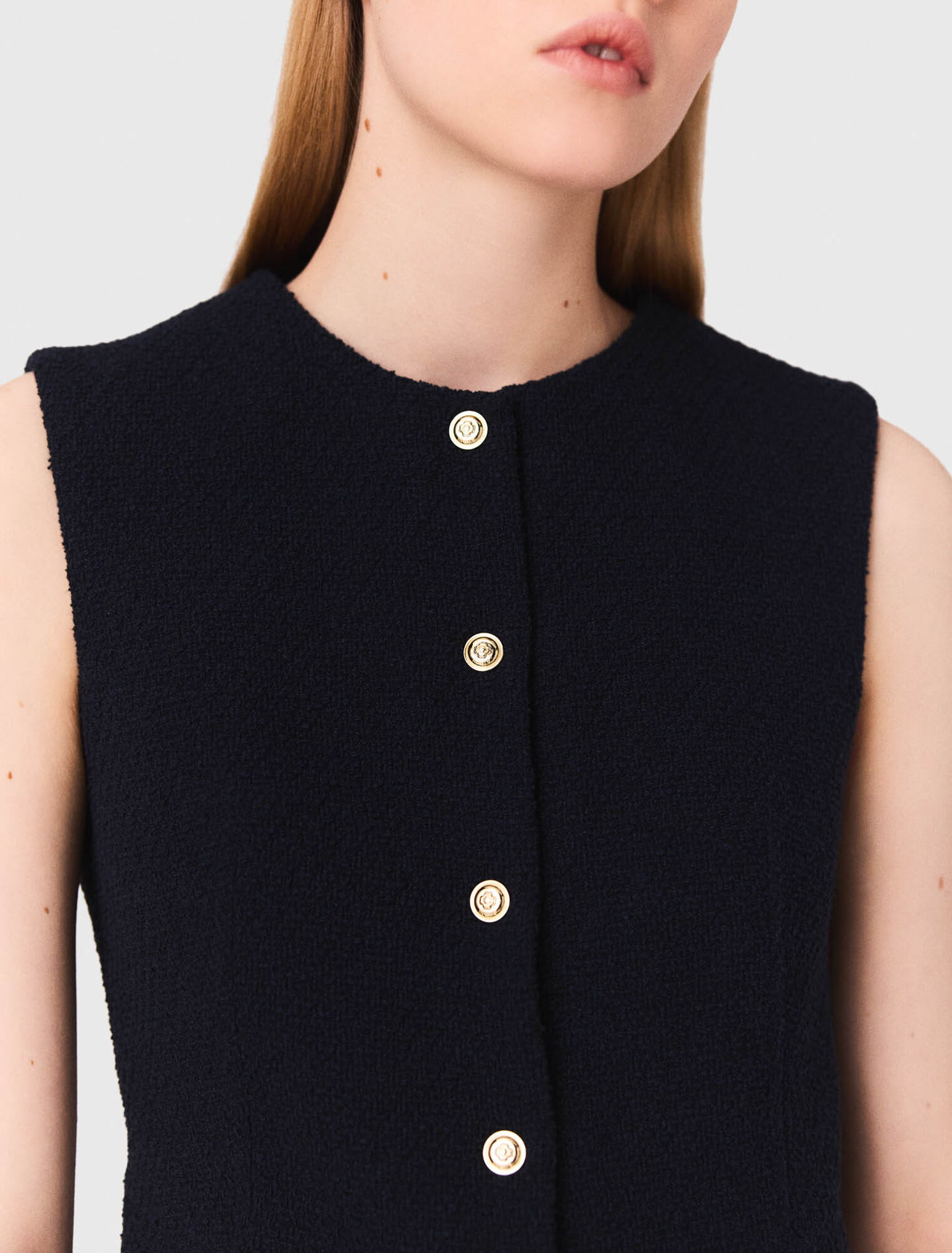 Chaqueta larga de tweed sin mangas