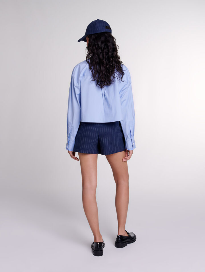 Pantalón corto trampantojo a rayas 