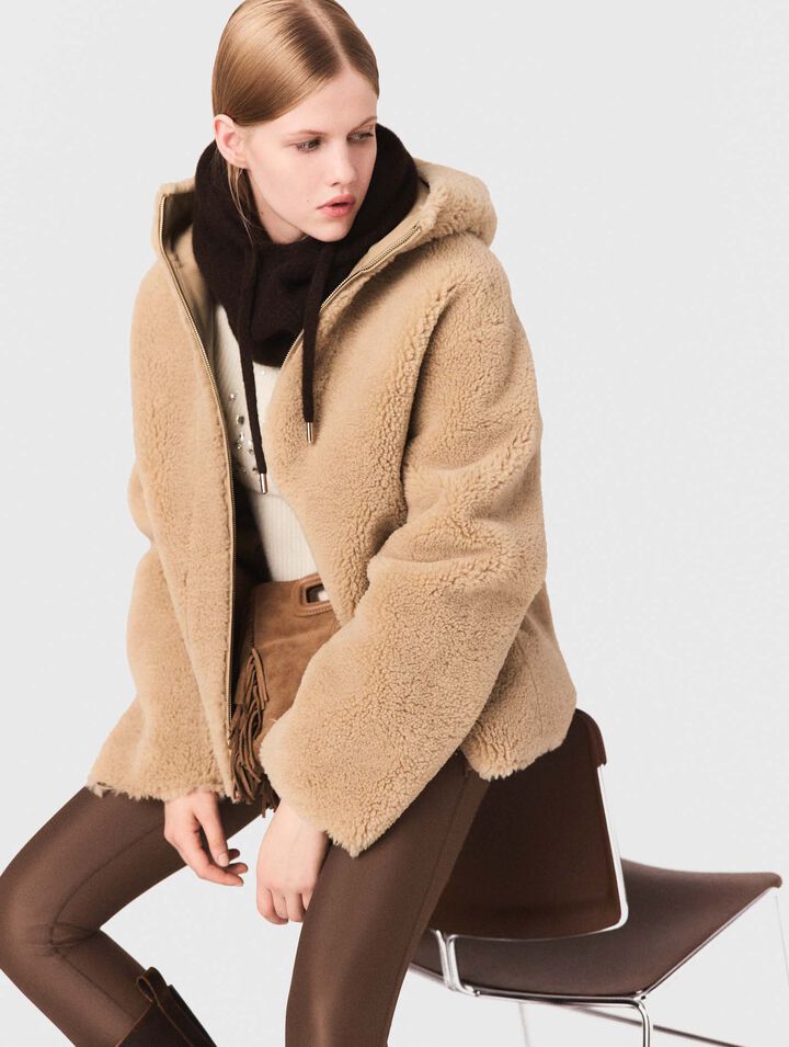 Abrigo reversible con capucha