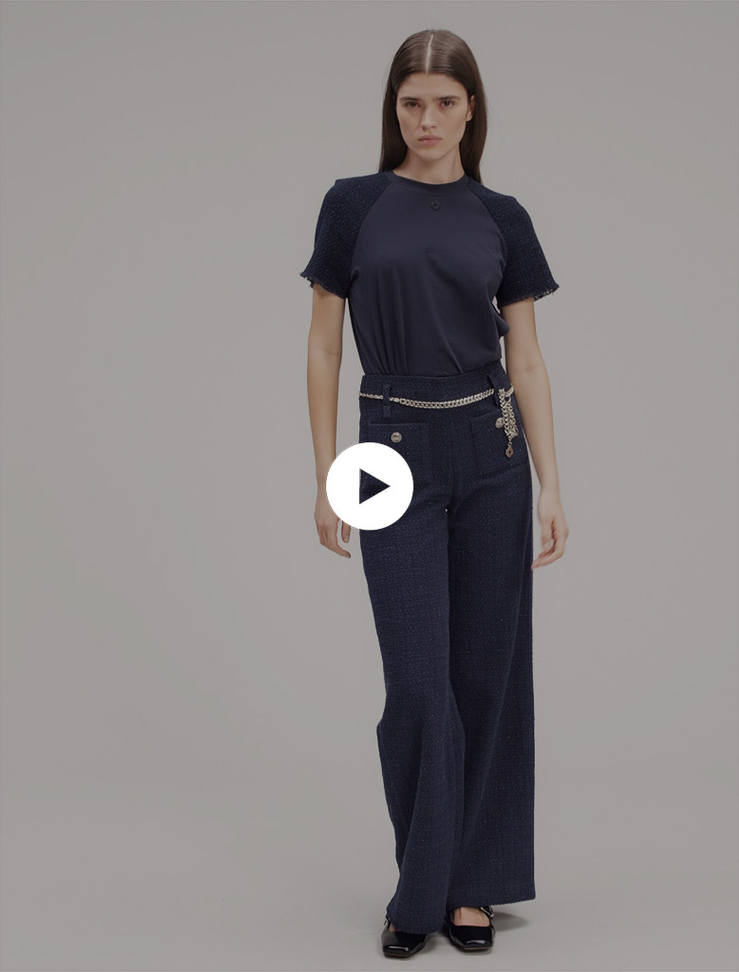 Pantalón tweed con cinturón cadena