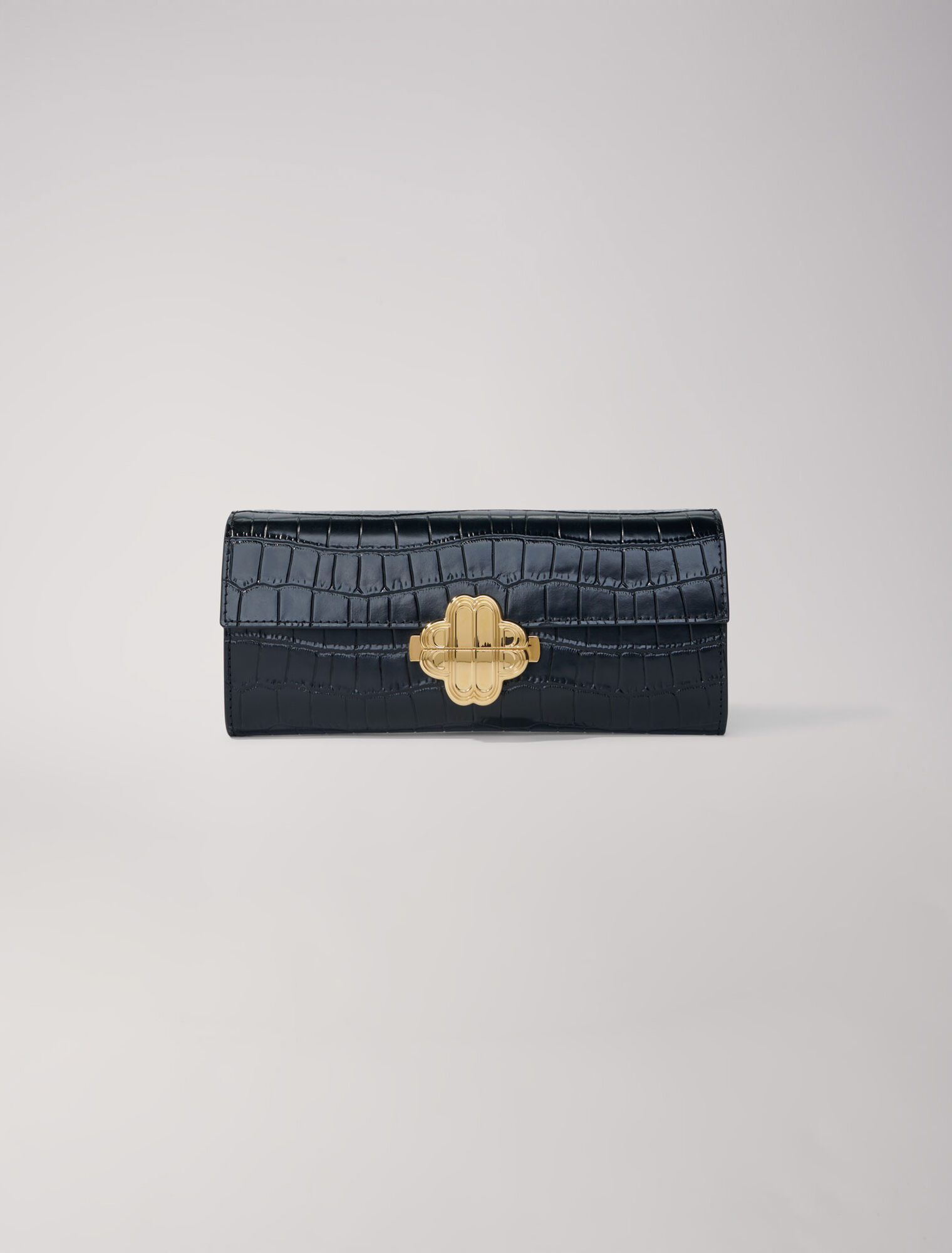 Bolso en cuero repujado de cocodrilo