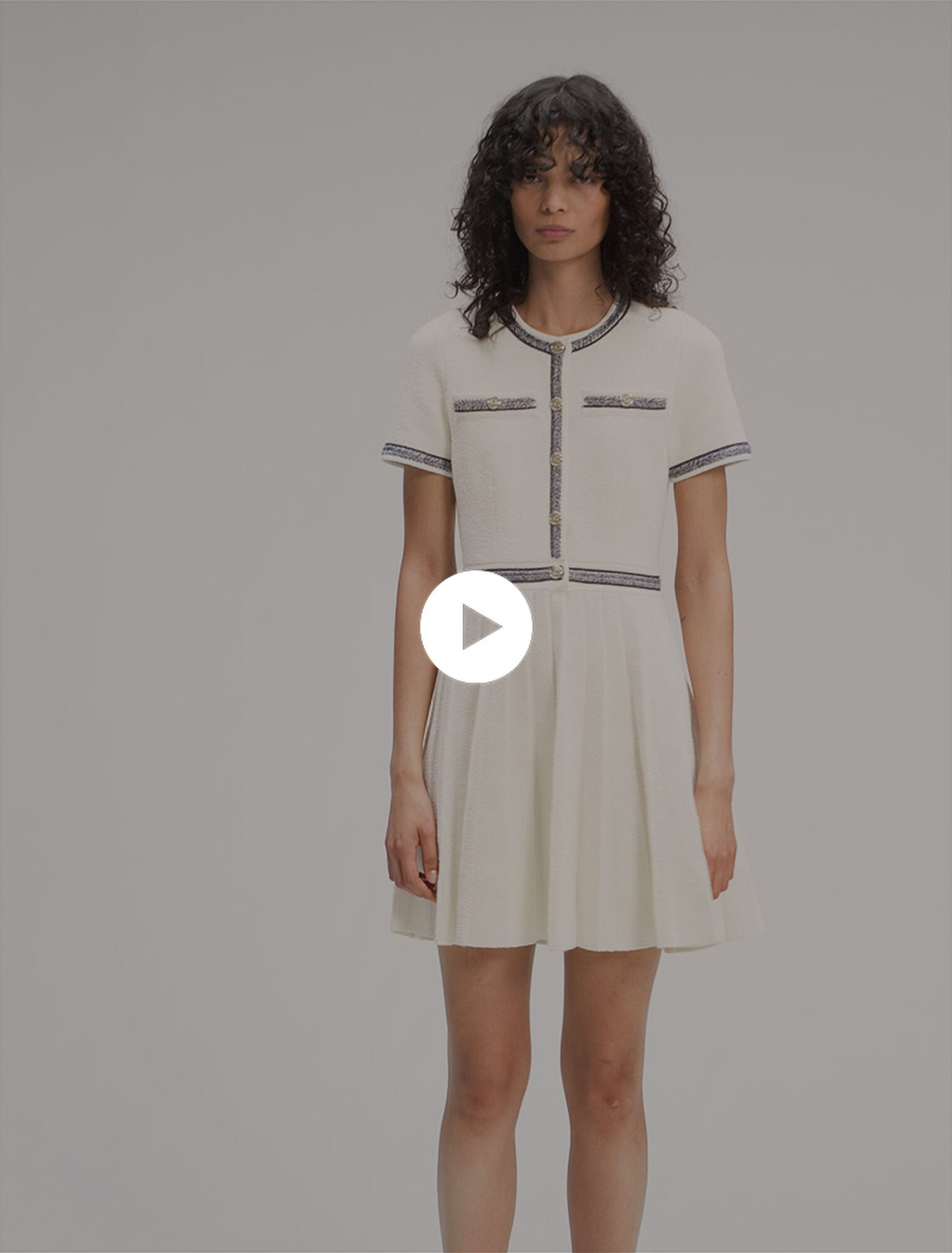 Vestido corto de punto plisado