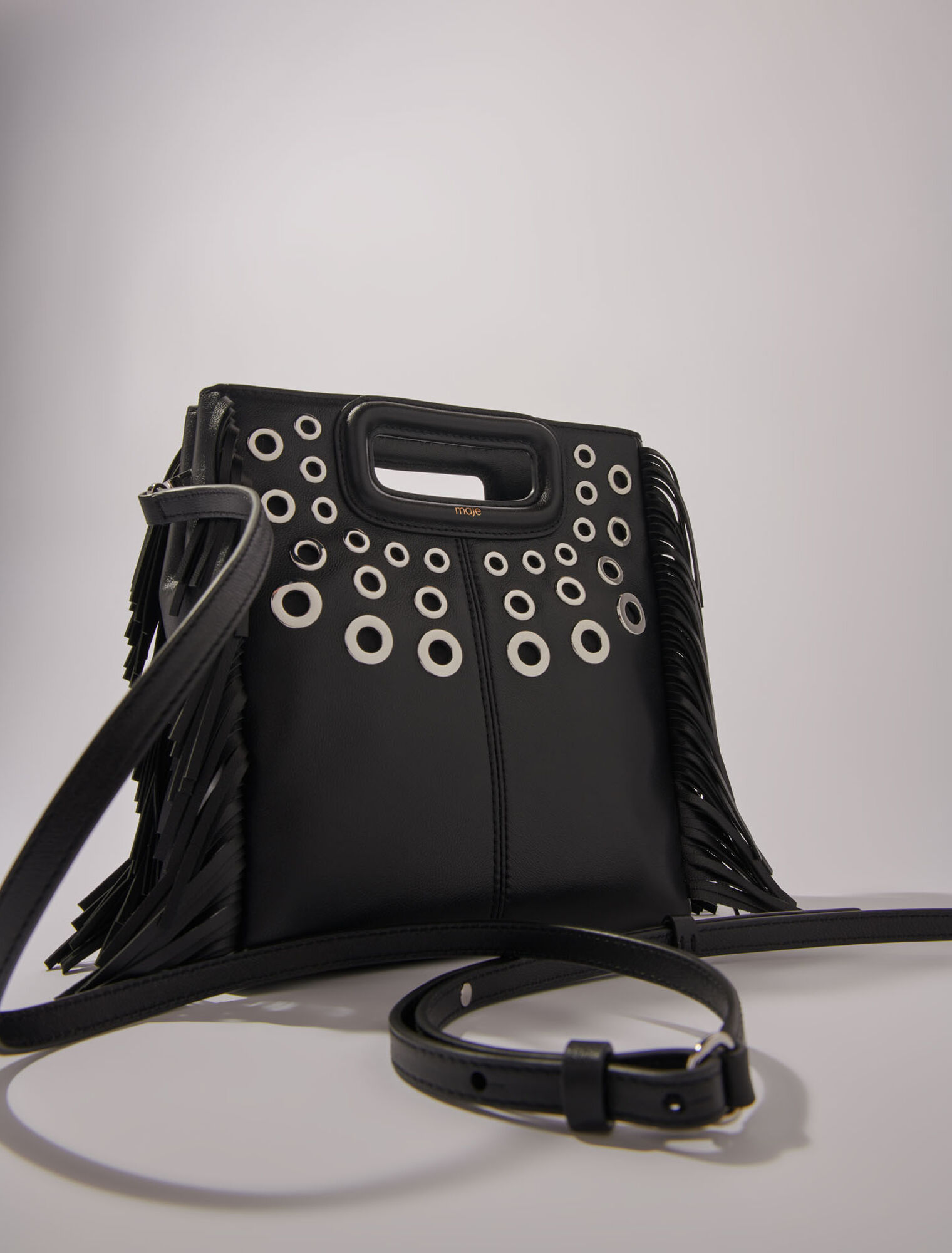 Bolso M de cuero con ojales