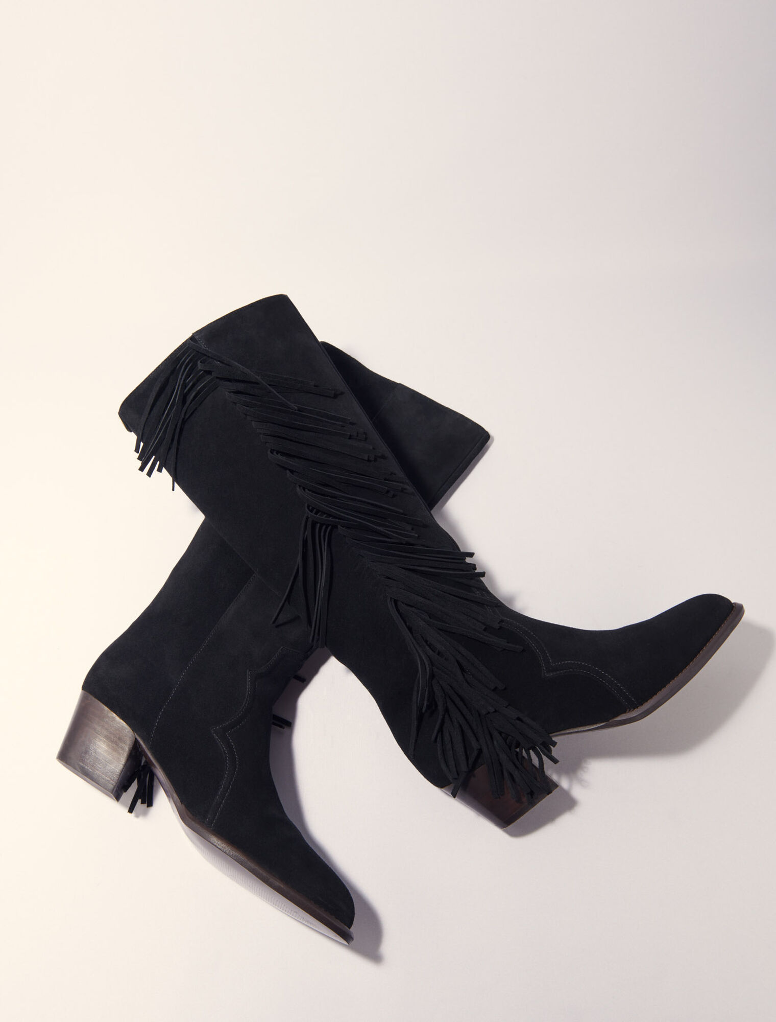 Botas de vaquero de ante con flecos