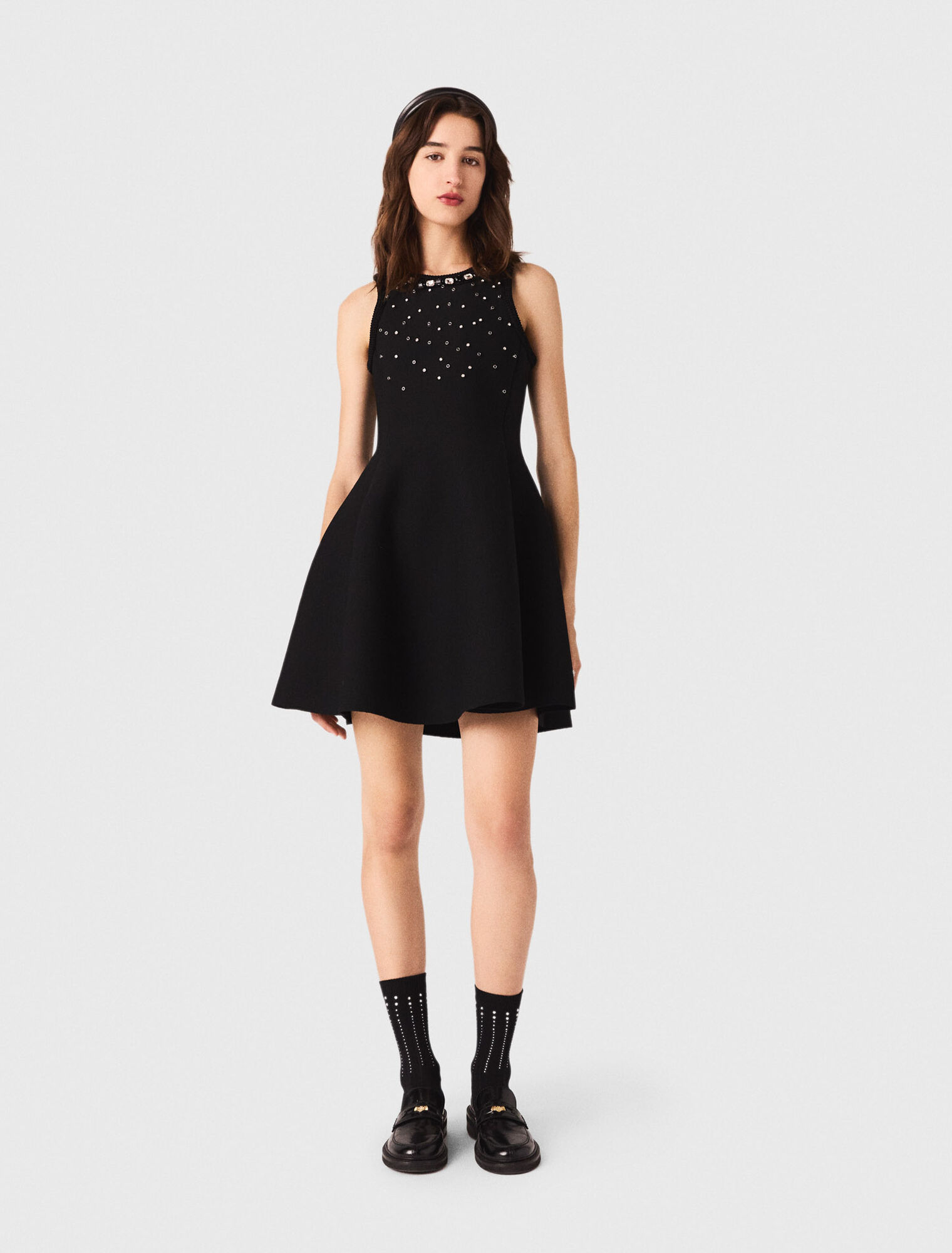 Vestido skater y detalles joya