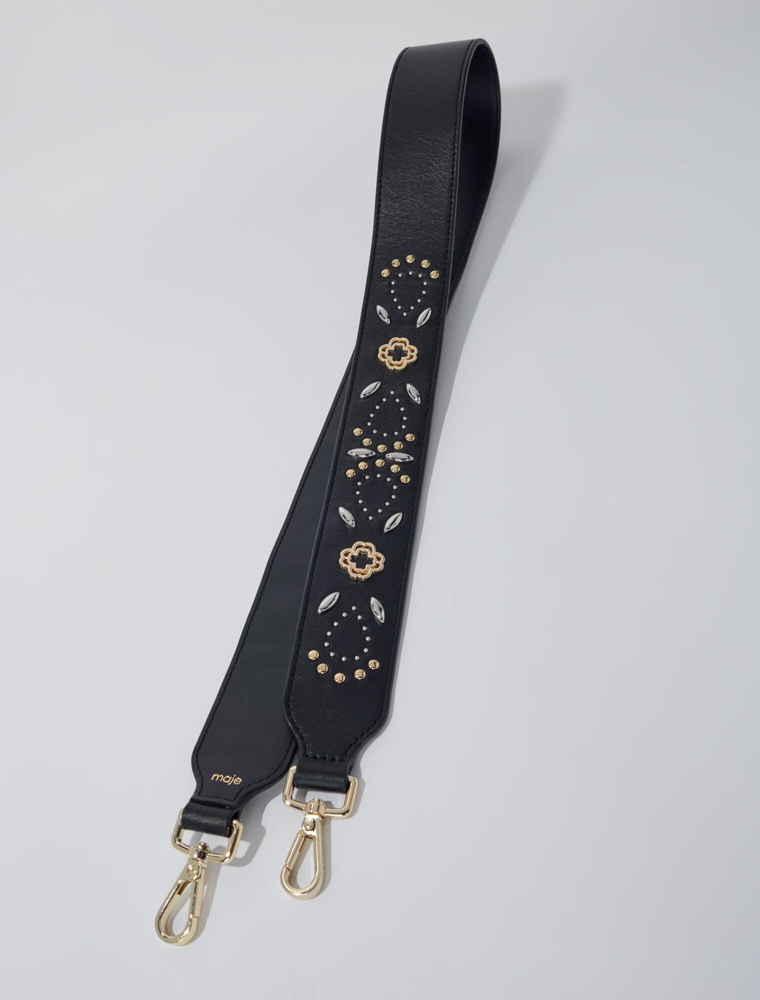 Bandolera de cuero con tachuelas