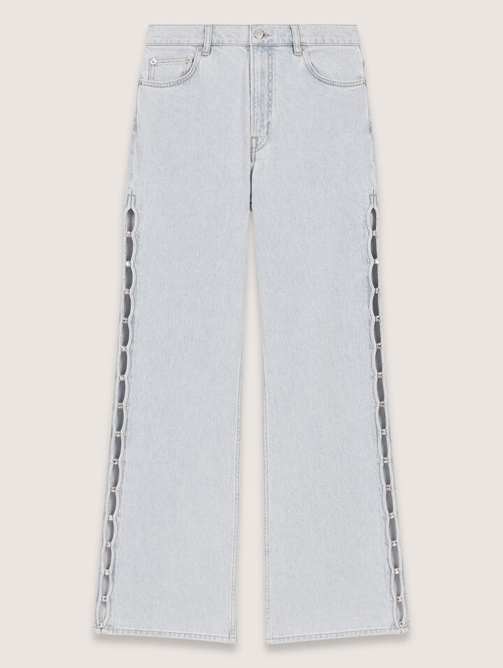 Pantalón vaquero abierto y detalles