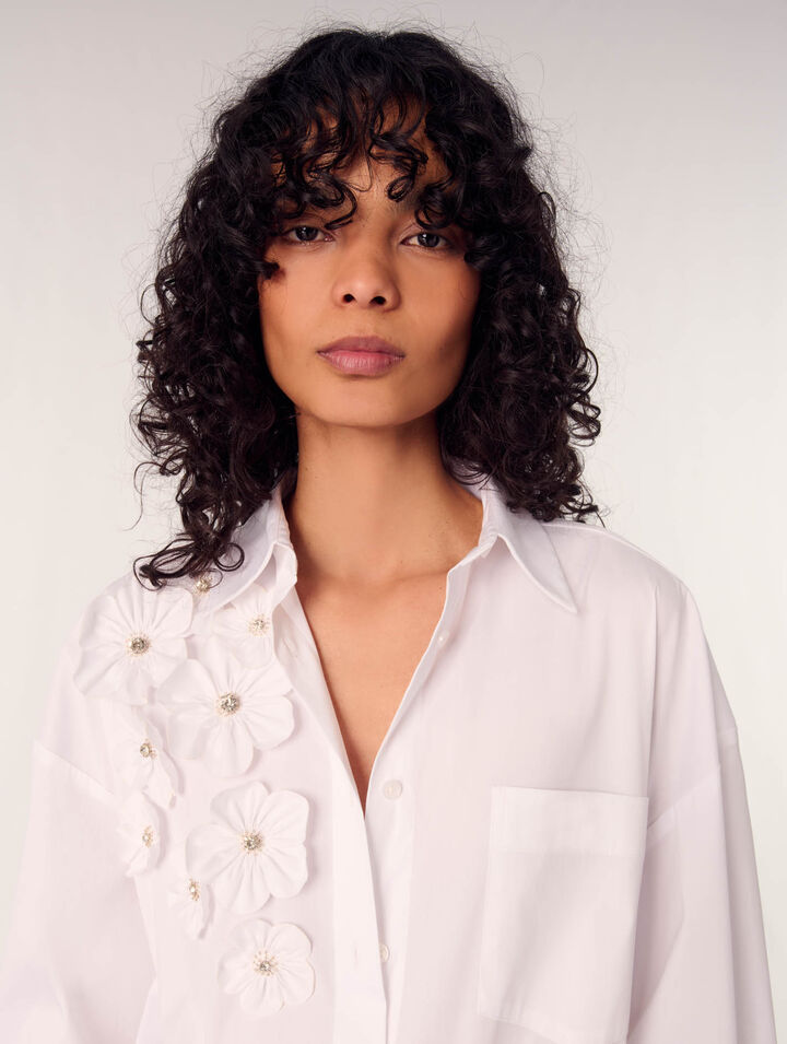 Camisa larga con flores bordadas