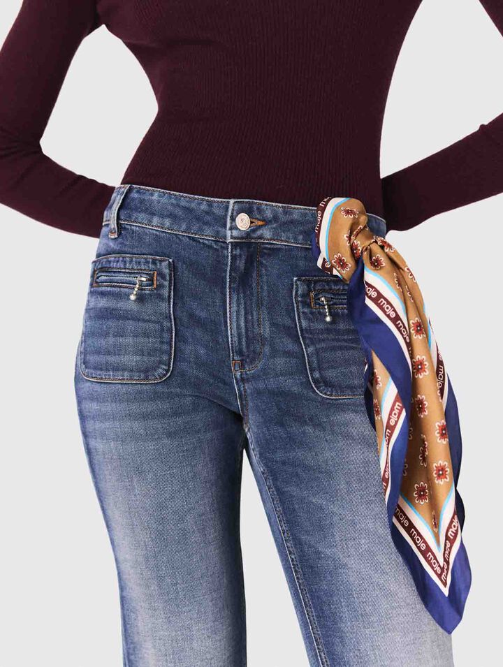 Vaquero bootcut con bolsillos