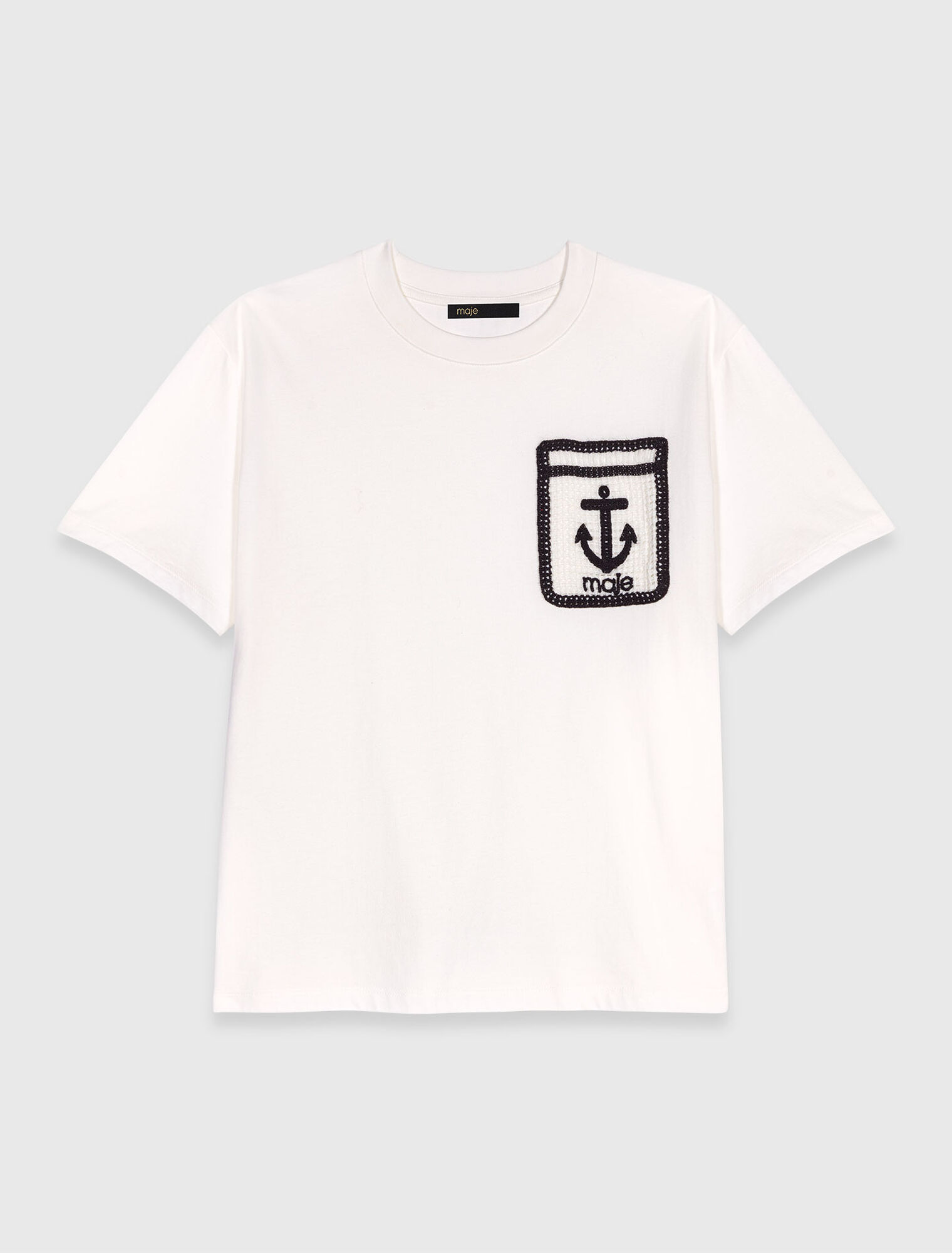 Camiseta con bolsillo bordado