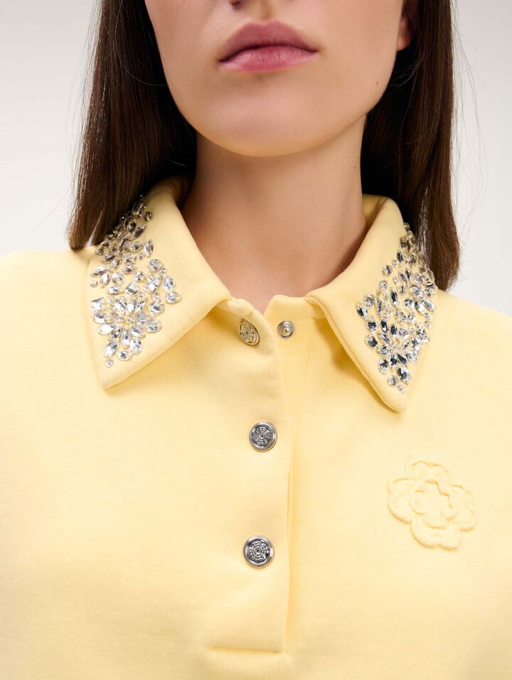 Sudadera corta con cuello joya