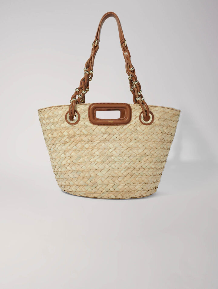 Cesta trenzada de rafia