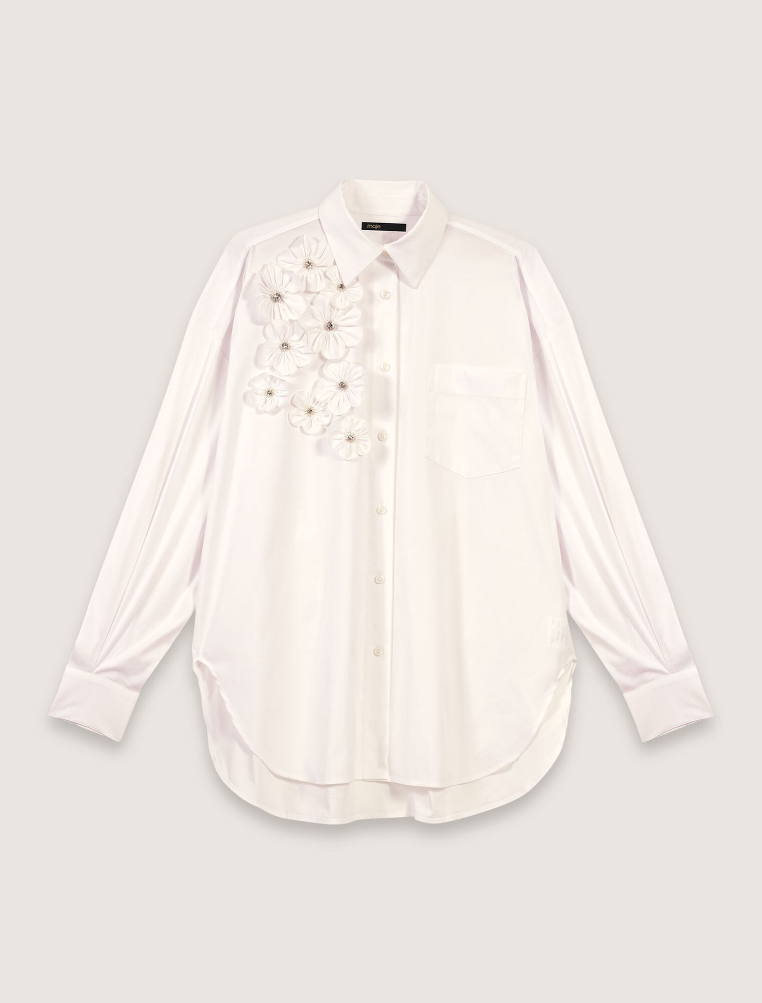 Camisa larga con flores bordadas