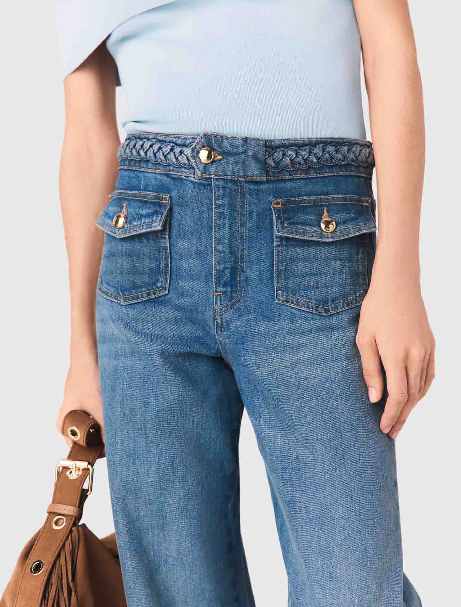 Vaquero acampanado con trenzas