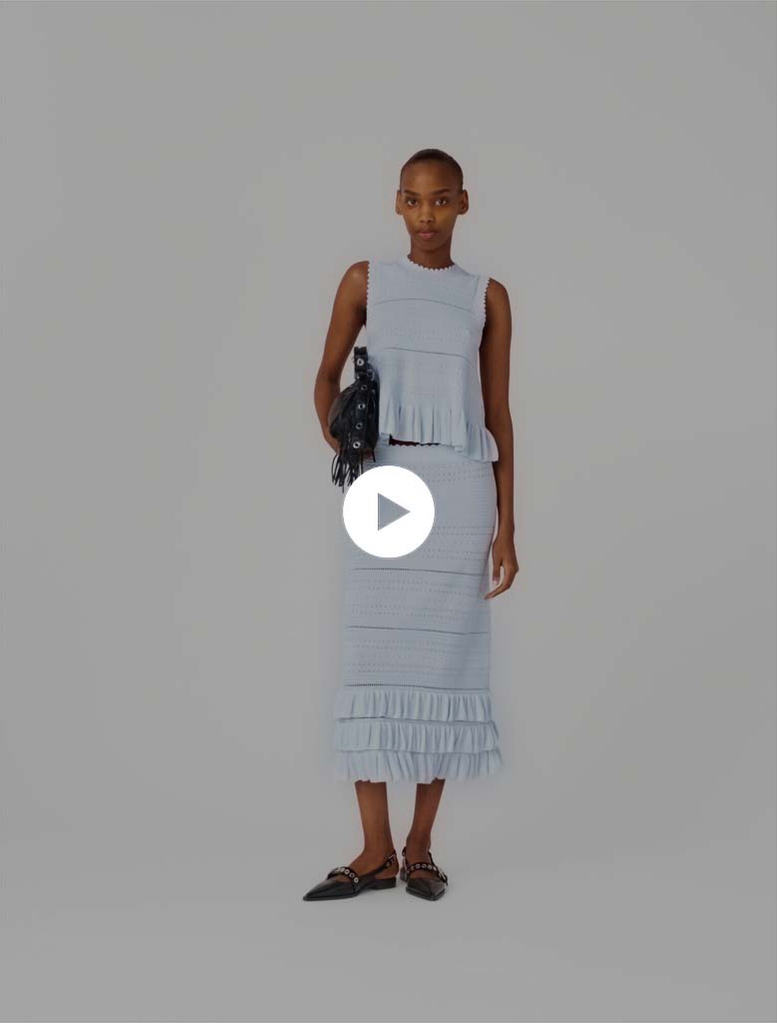 Falda larga de punto con volantes