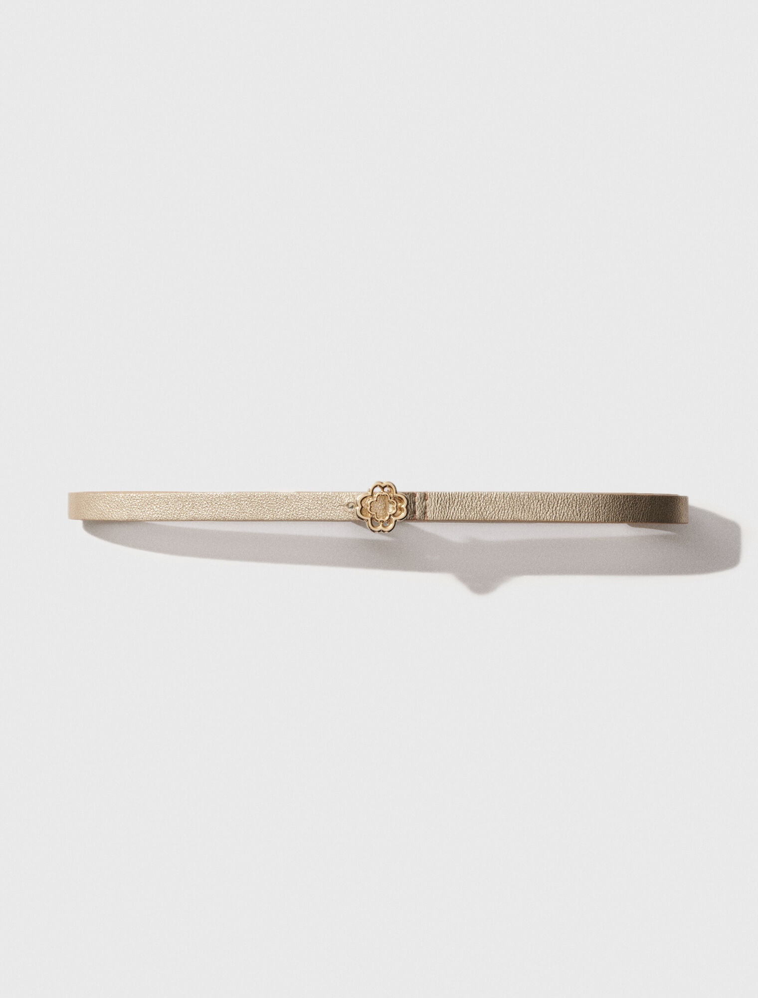 Cinturón fino con hebilla Clover