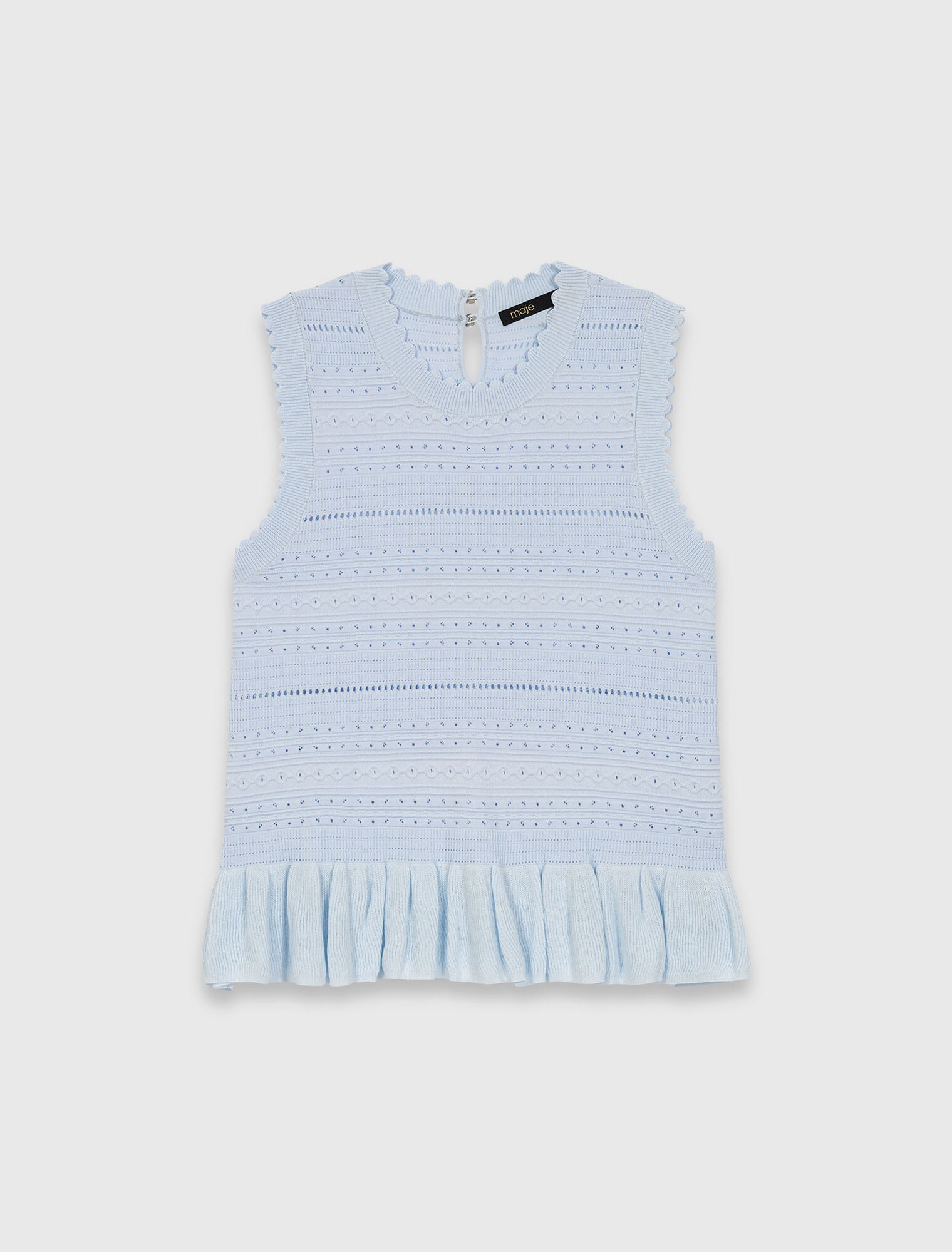 Top de punto con volantes