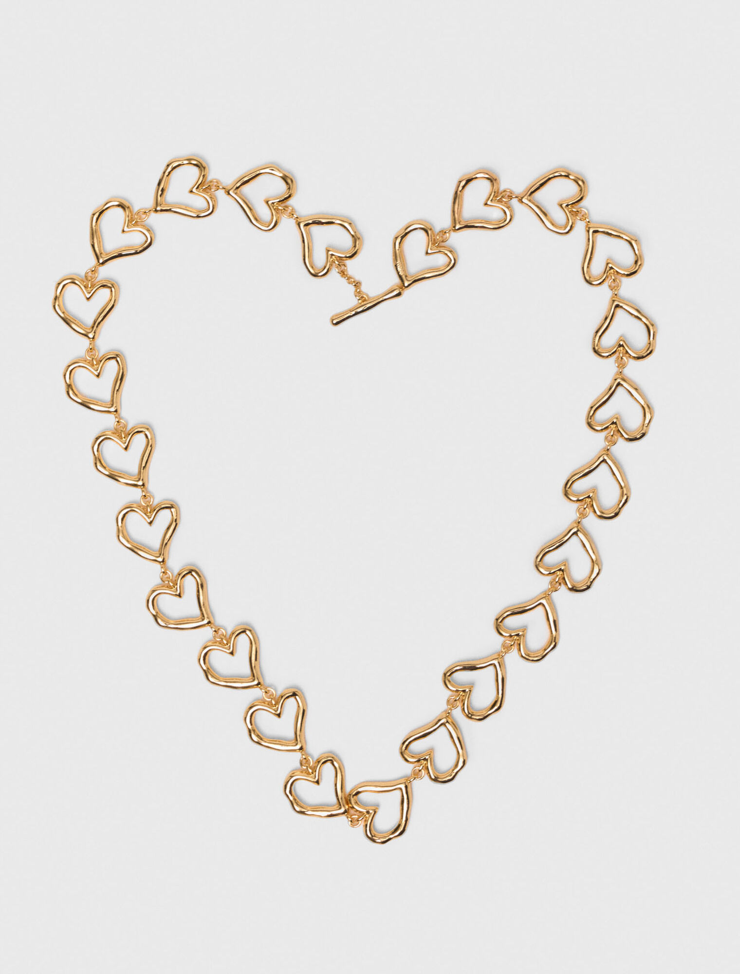 Collar corazón de latón dorado