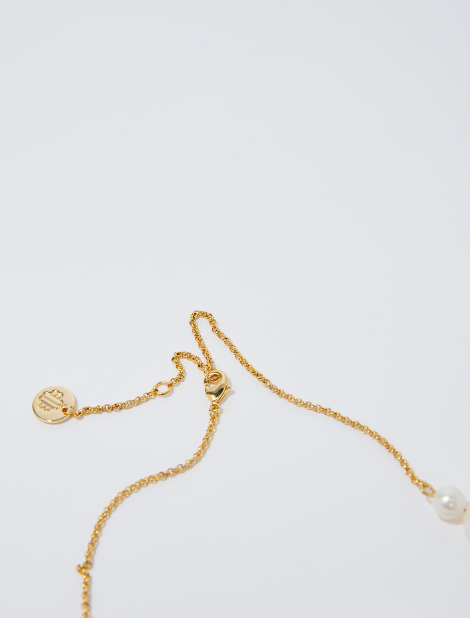 Collar dorado de cadena y abalorios