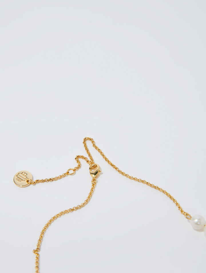 Collar dorado de cadena y abalorios
