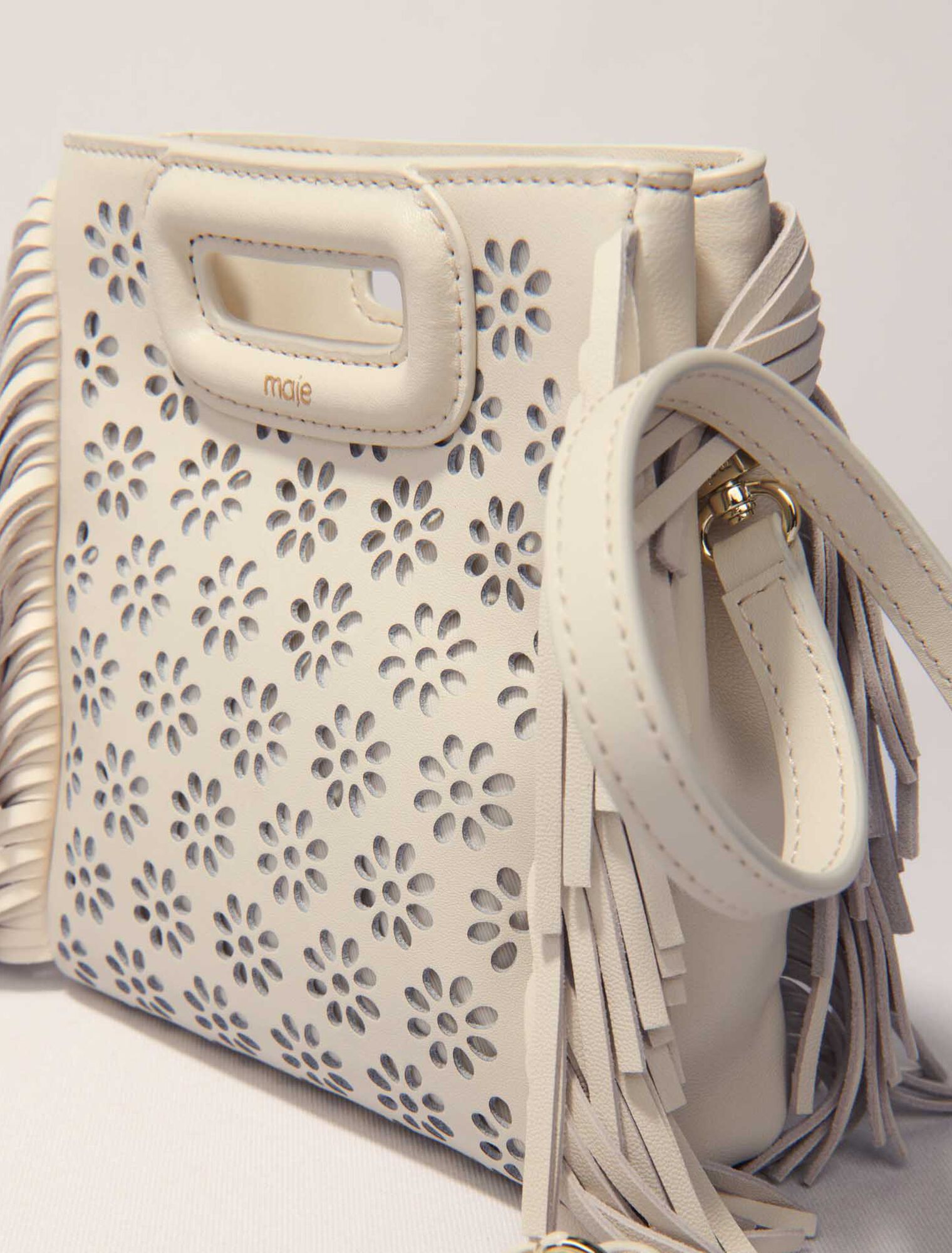 Bolso M mini de piel perforada