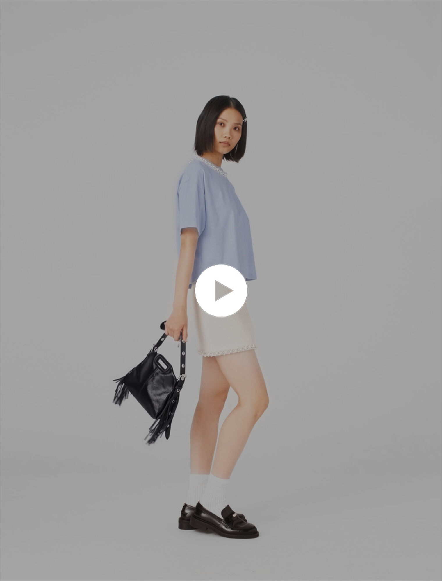 Camiseta con cuello joya