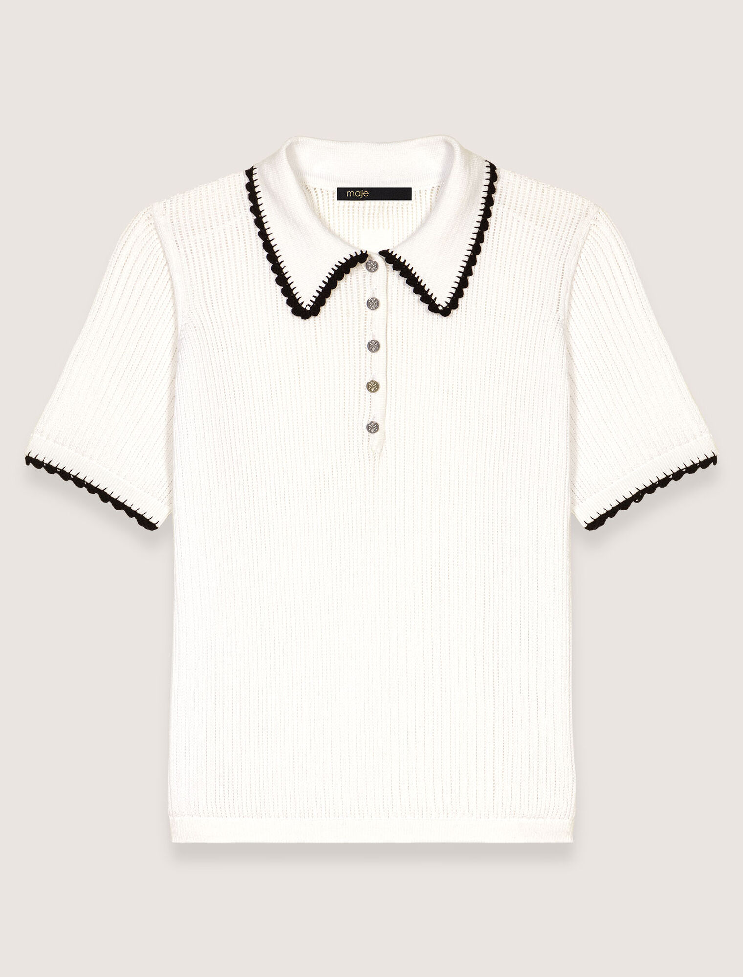 Polo de punto canalé y ganchillo