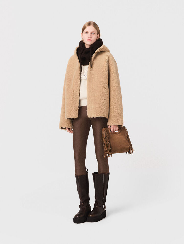Abrigo reversible con capucha