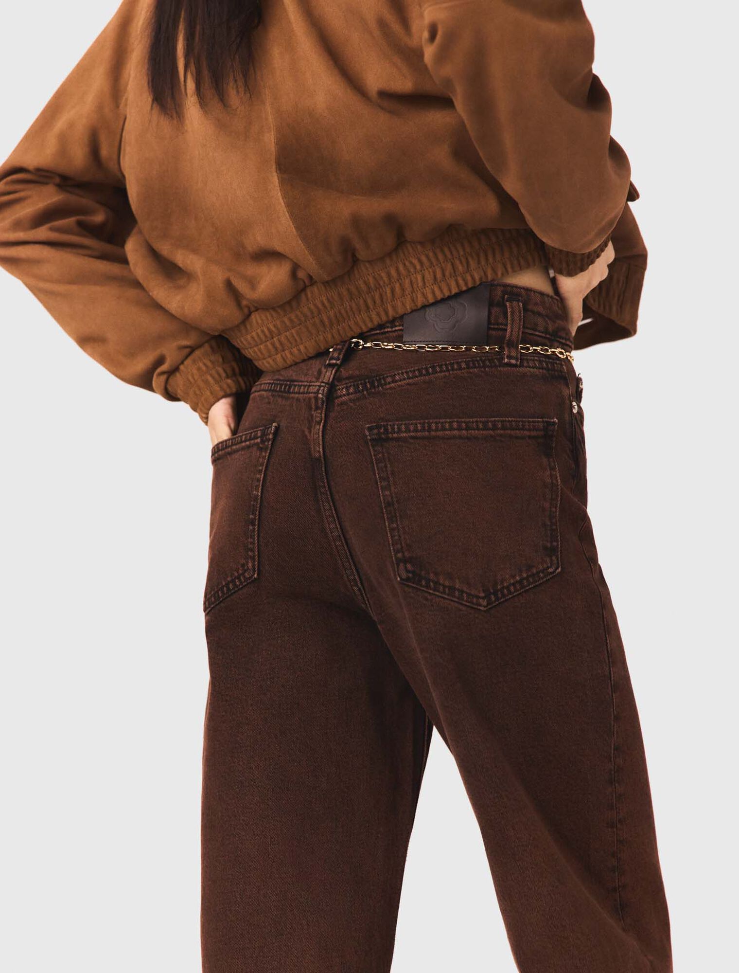 Vaquero bootcut con cadena