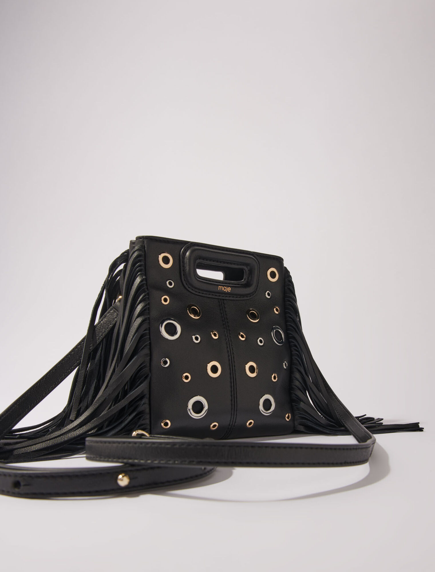 Bolso M mini de cuero con ojales