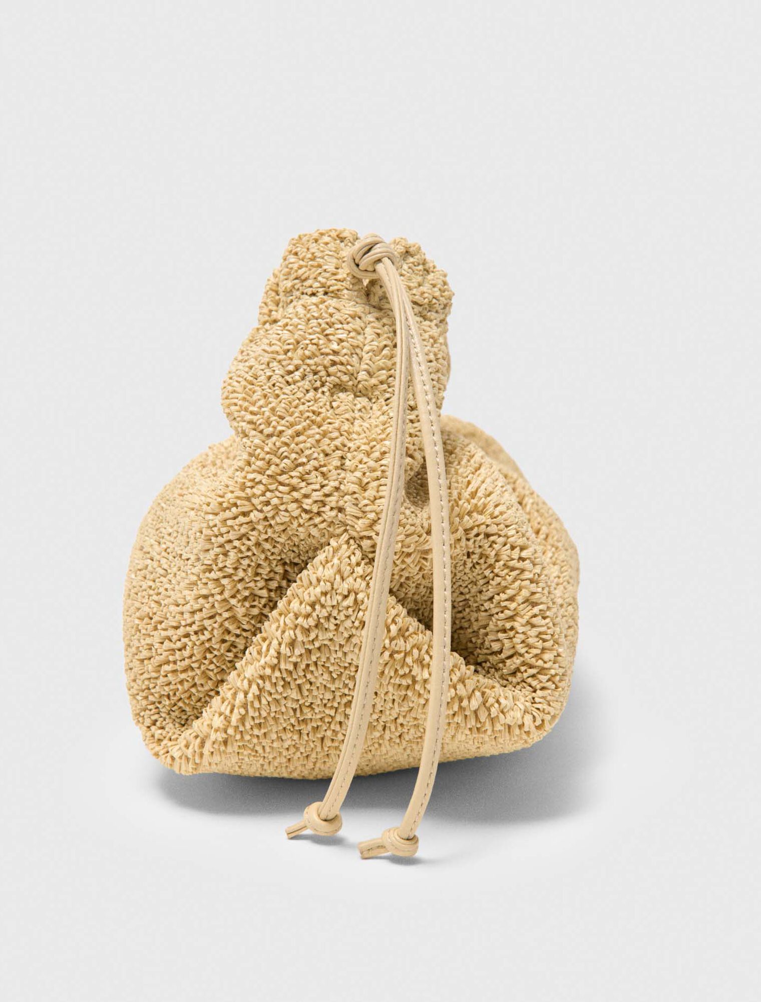 Bolso de mano Mipli con efecto rizado