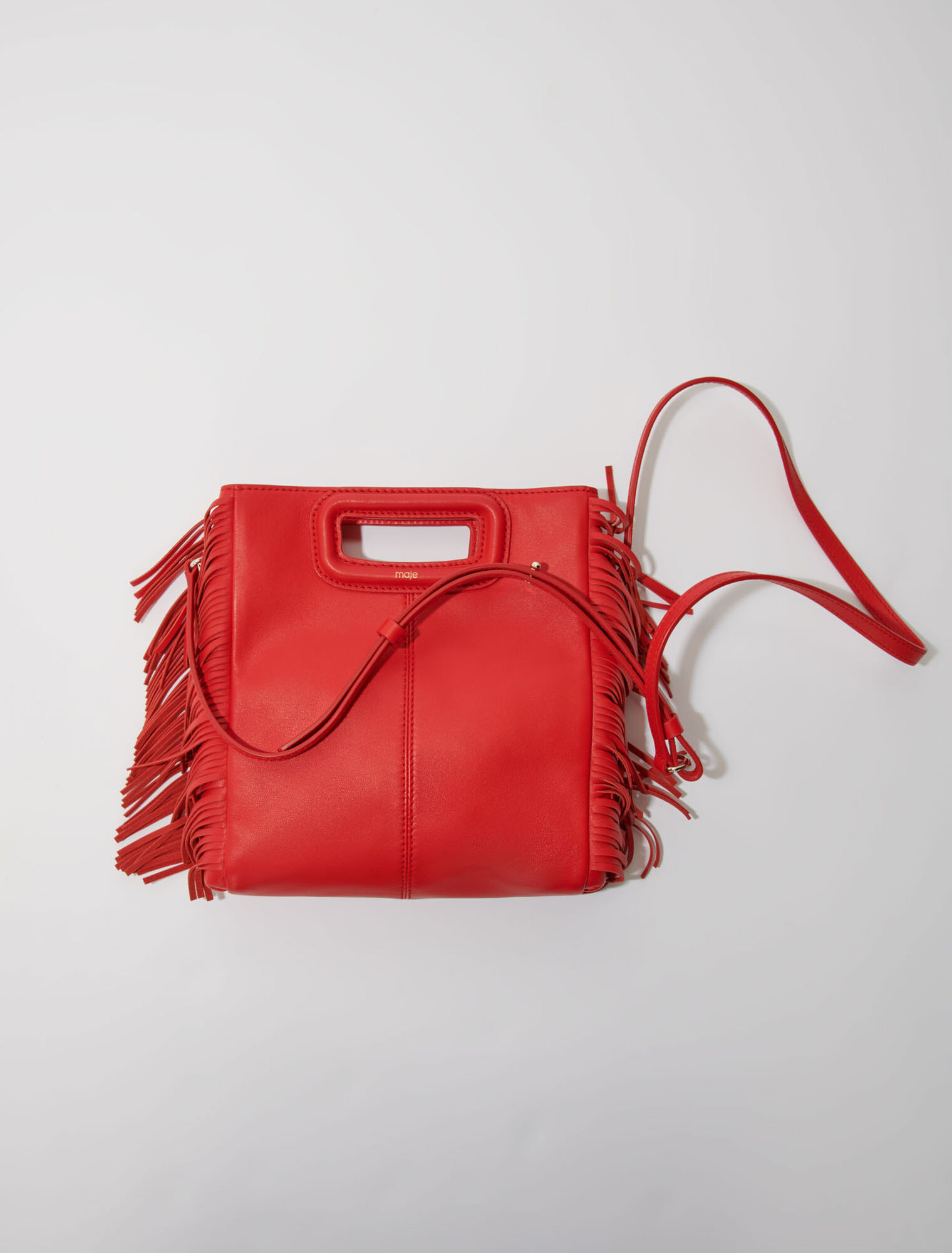 Bolso M con flecos de piel lisa