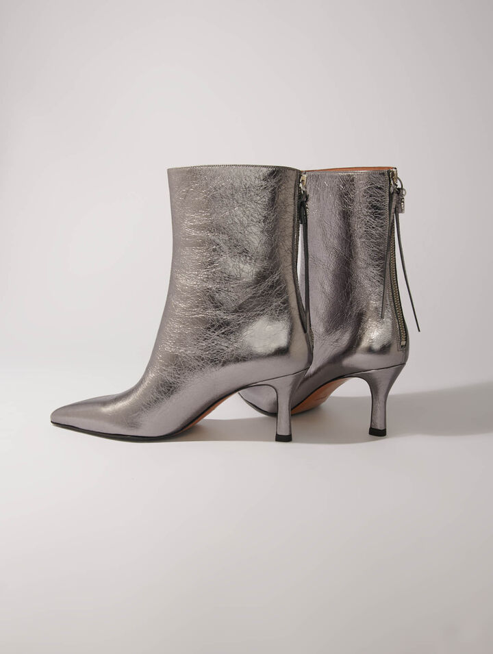 Botines con puntera metalizada
