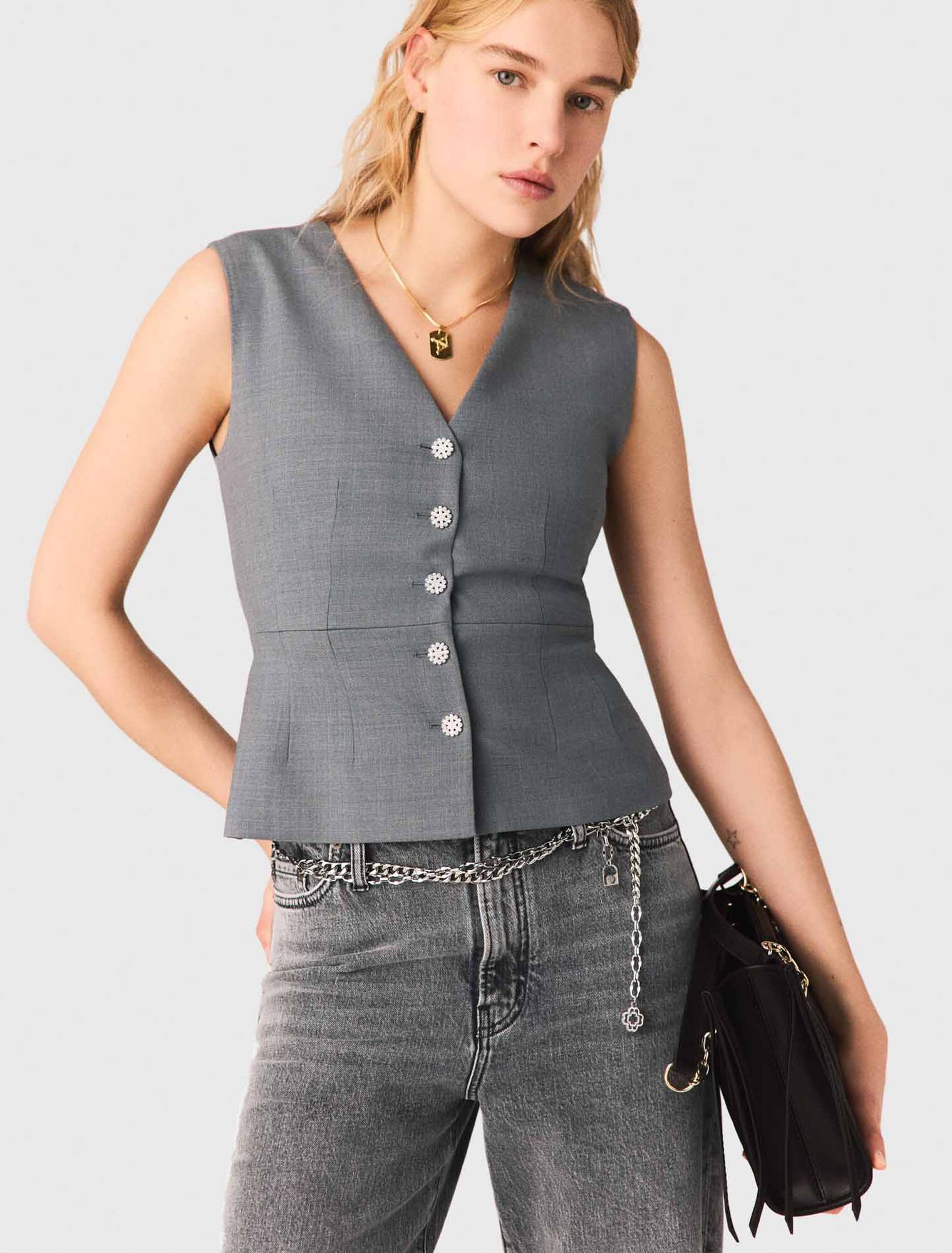 Chaleco de sastre con botones joya