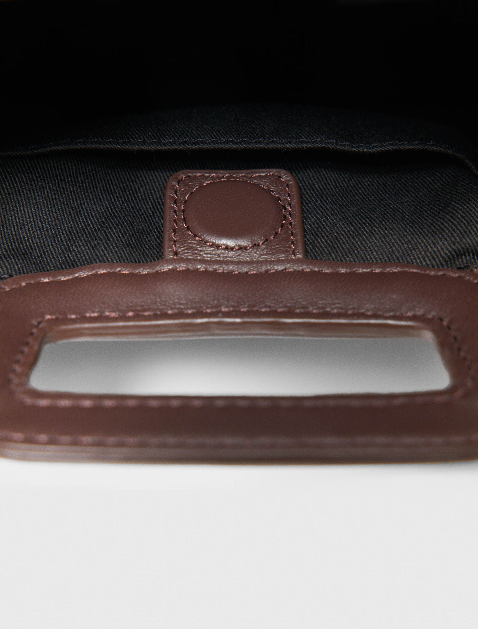 Bolso de mano Mipli con efecto rizado