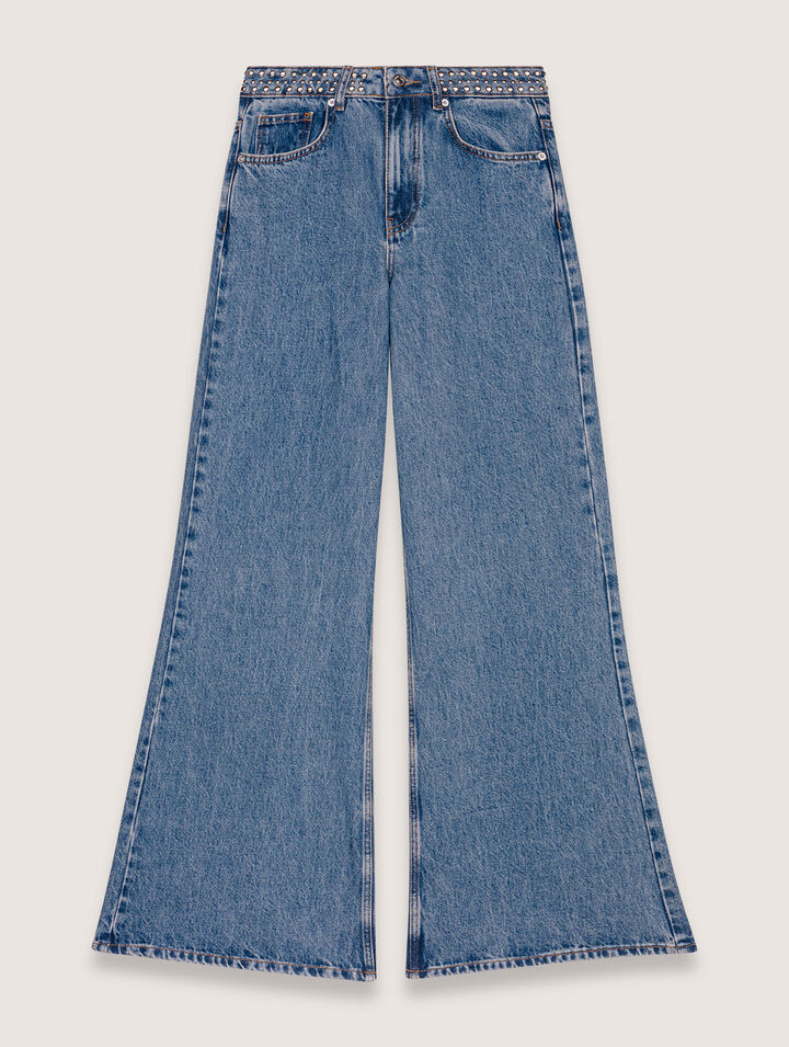 Jeans flare con cintura de clavos