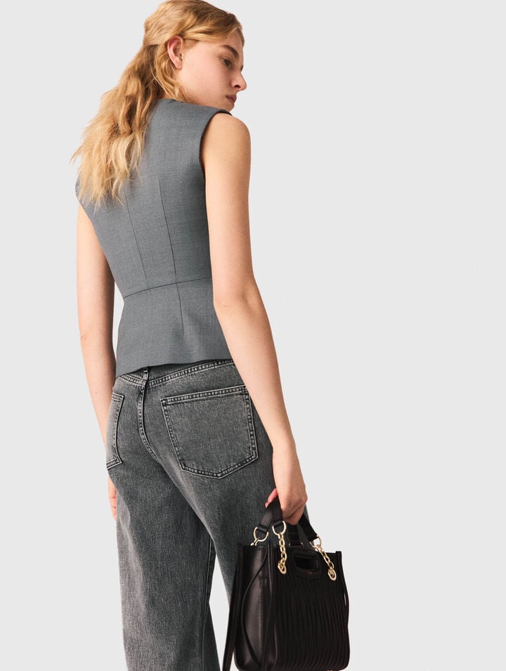 Chaleco de sastre con botones joya