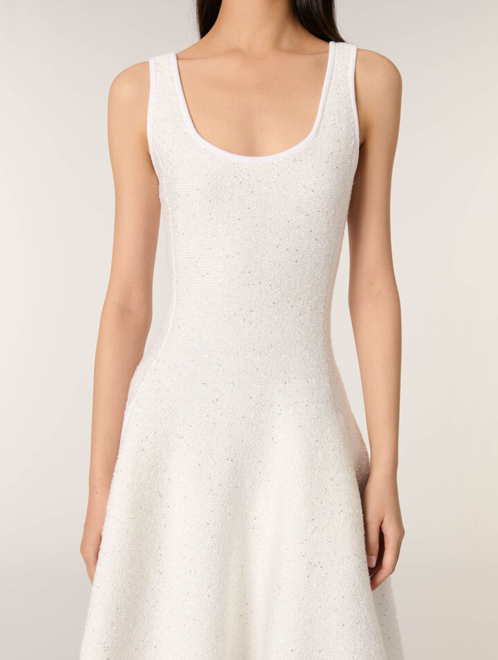 Vestido corto de punto y lentejuelas