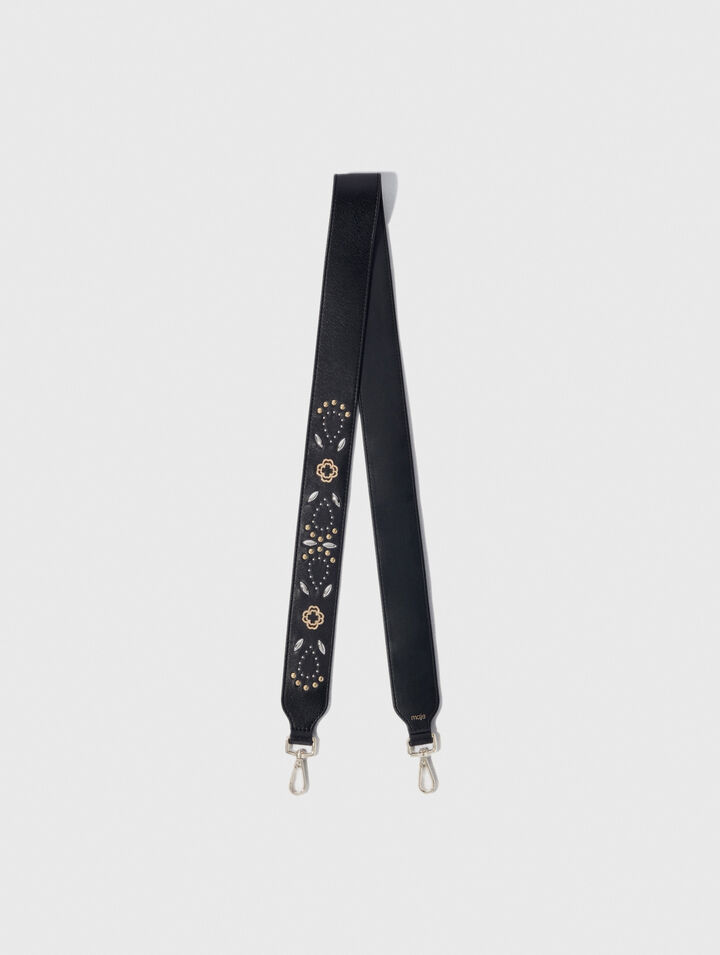 Bandolera de cuero con tachuelas