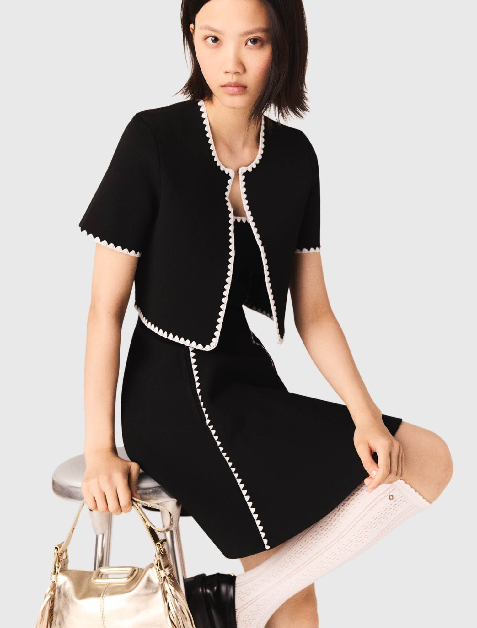 Cárdigan corto con pespuntes