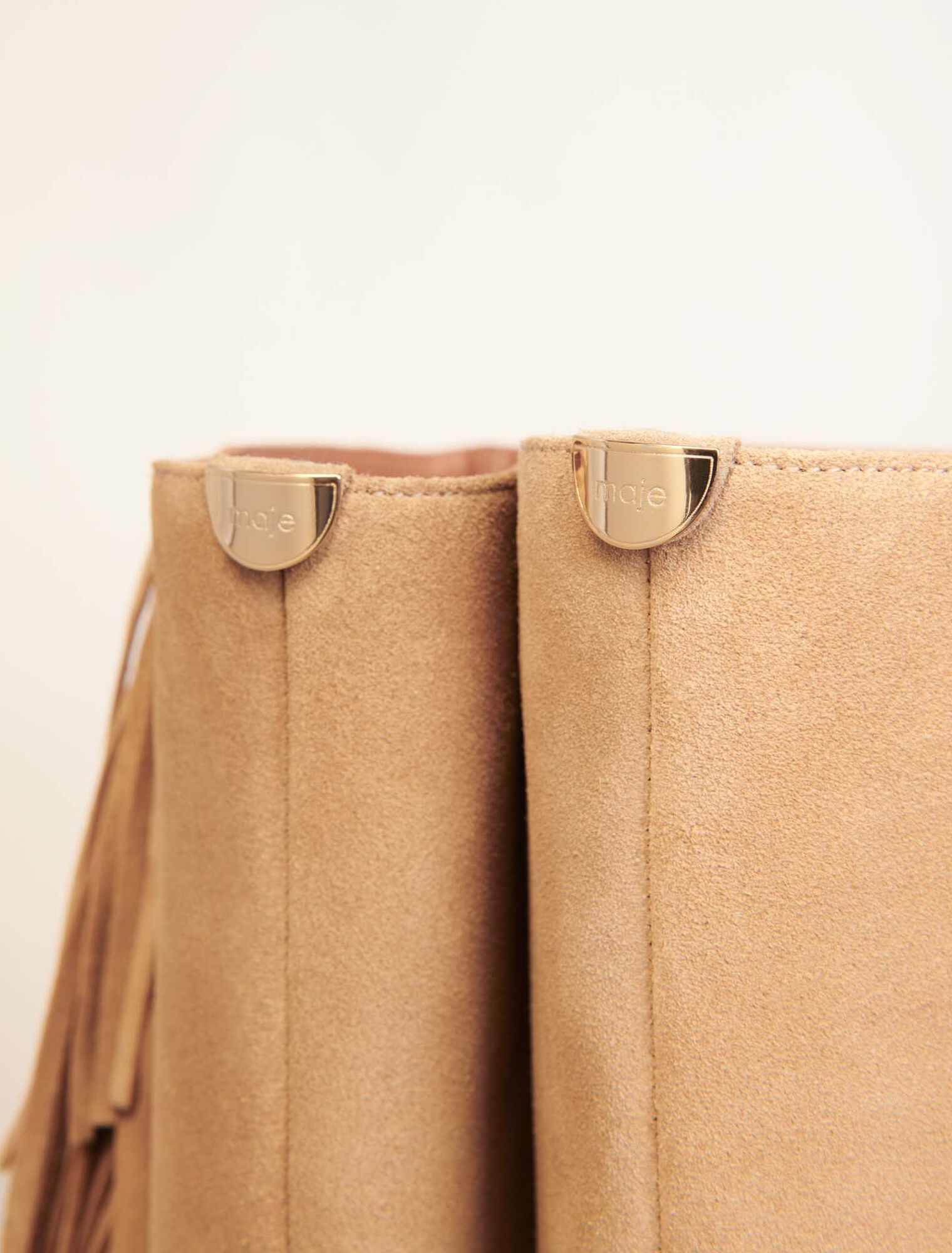 Botas de vaquero de ante con flecos