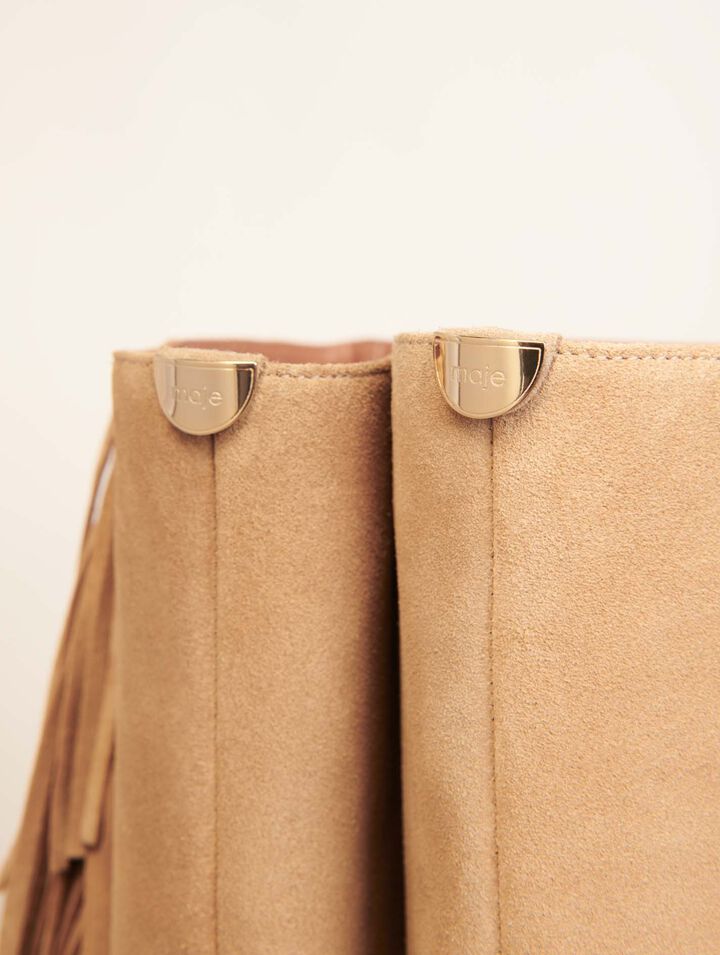 Botas de vaquero de ante con flecos