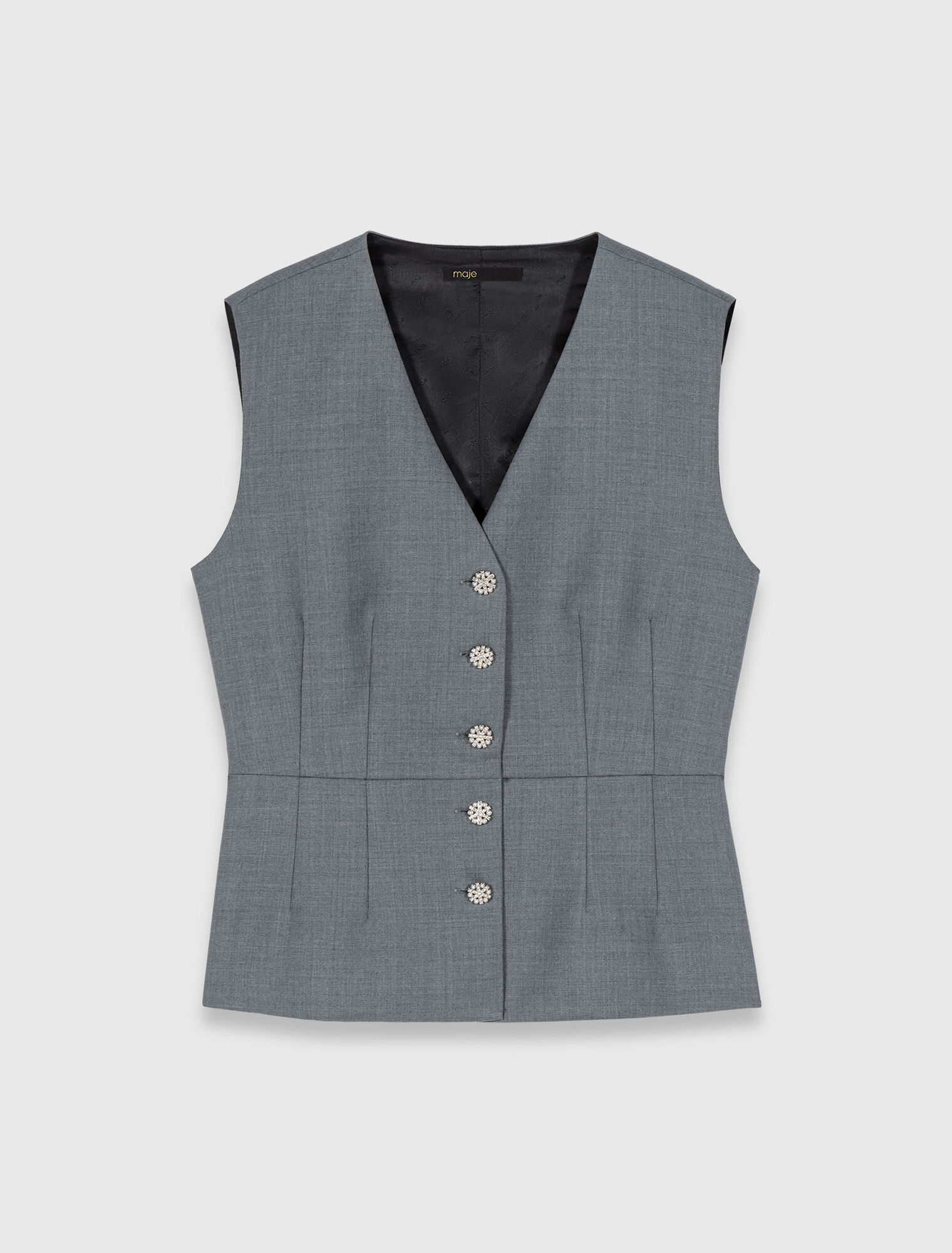 Chaleco de sastre con botones joya