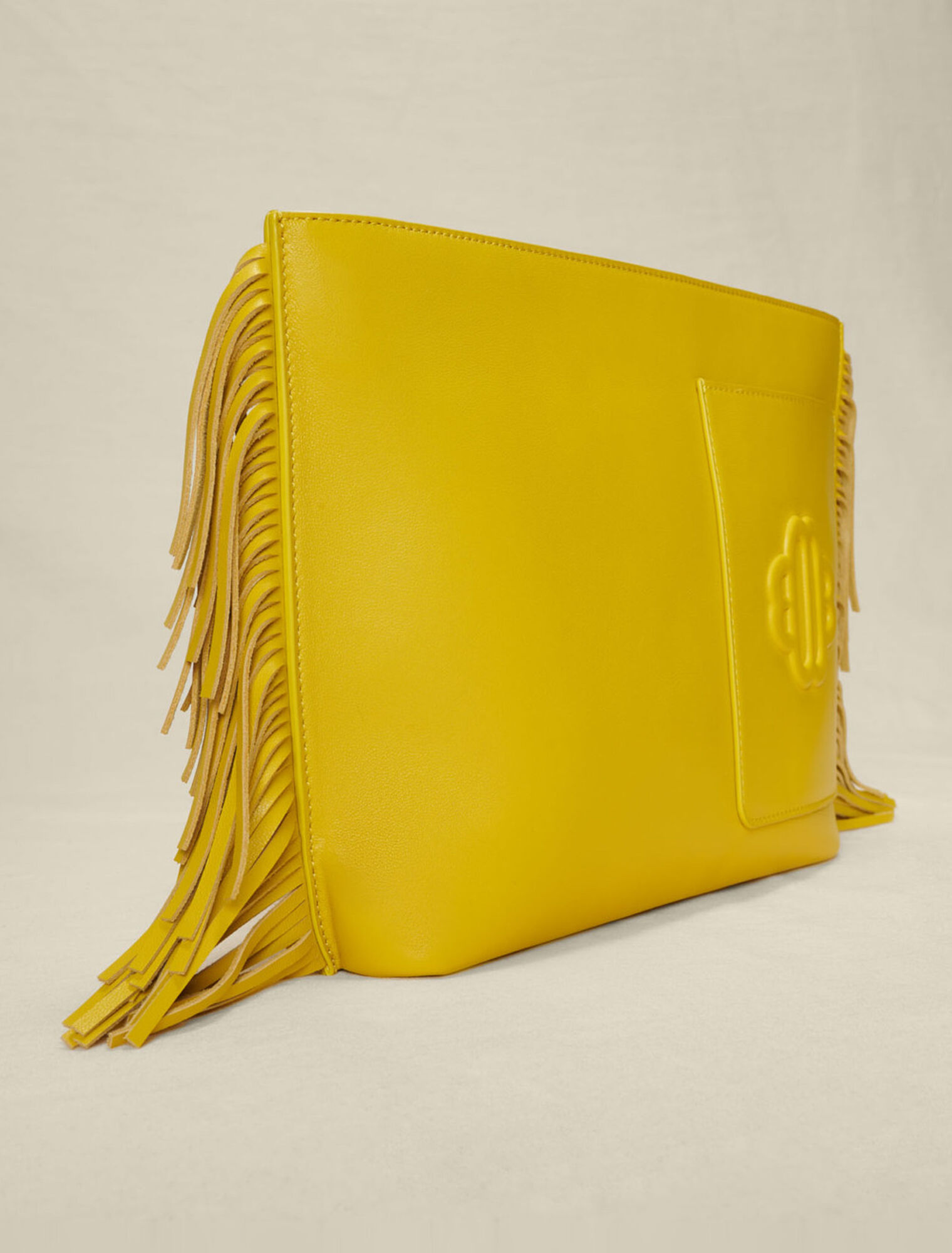 Bolso de mano de piel con flecos