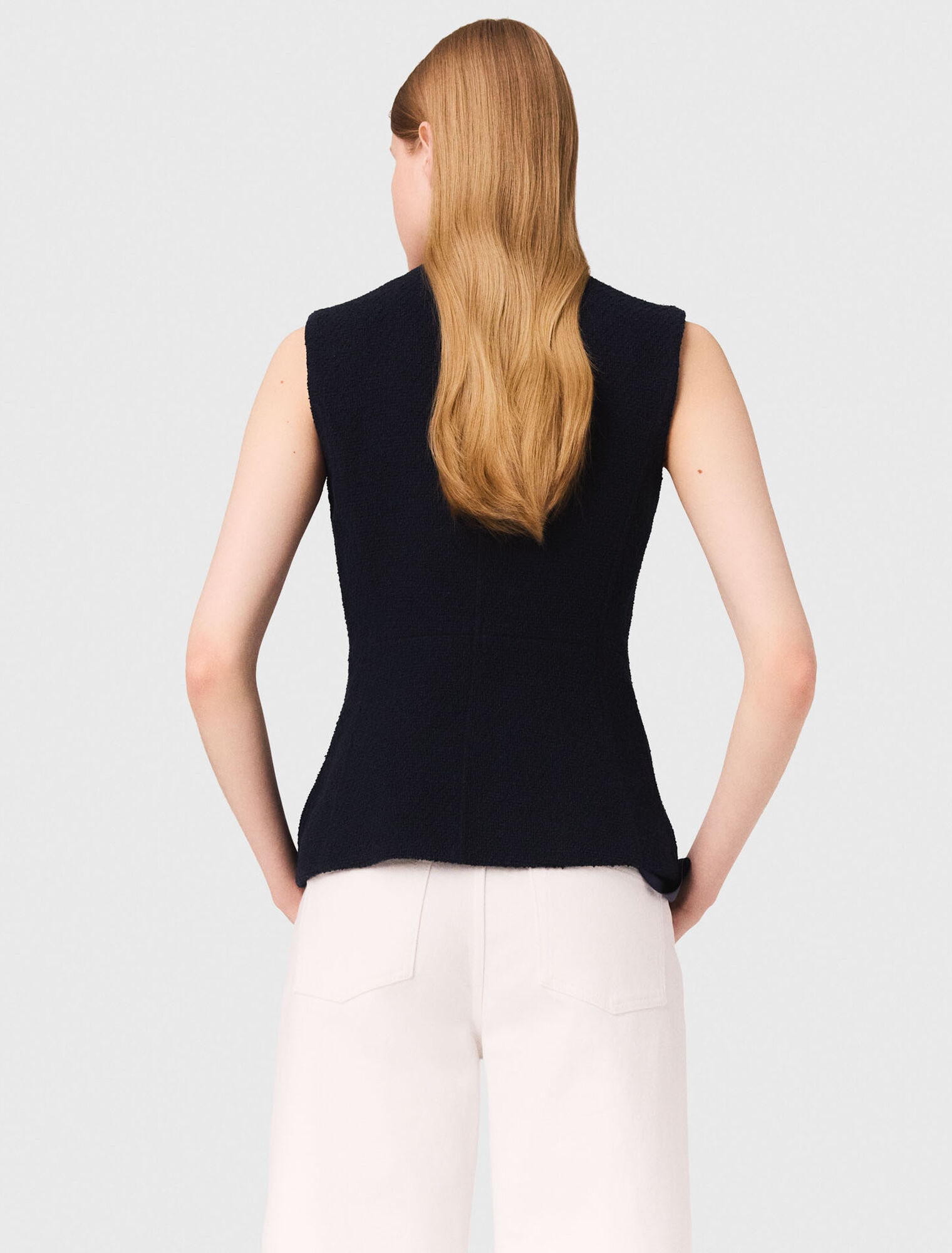 Chaqueta larga de tweed sin mangas