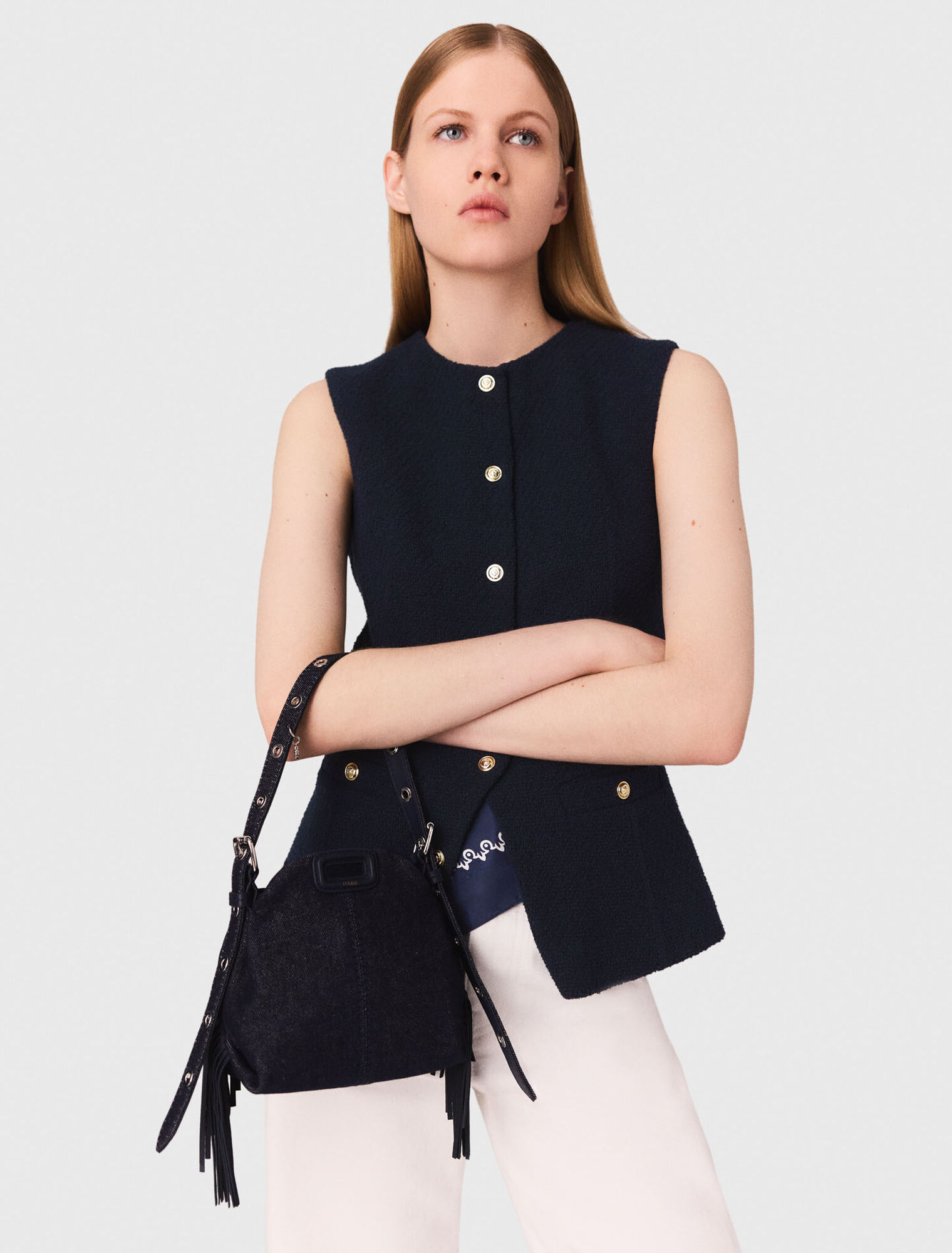 Chaqueta larga de tweed sin mangas