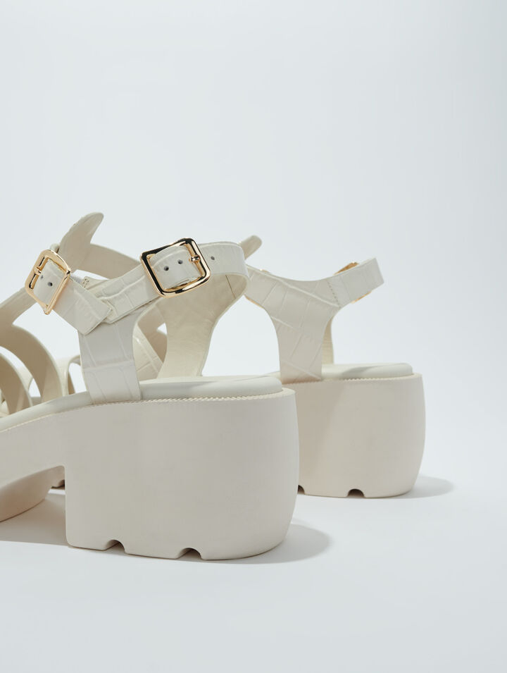Sandalias de suela dentada en piel